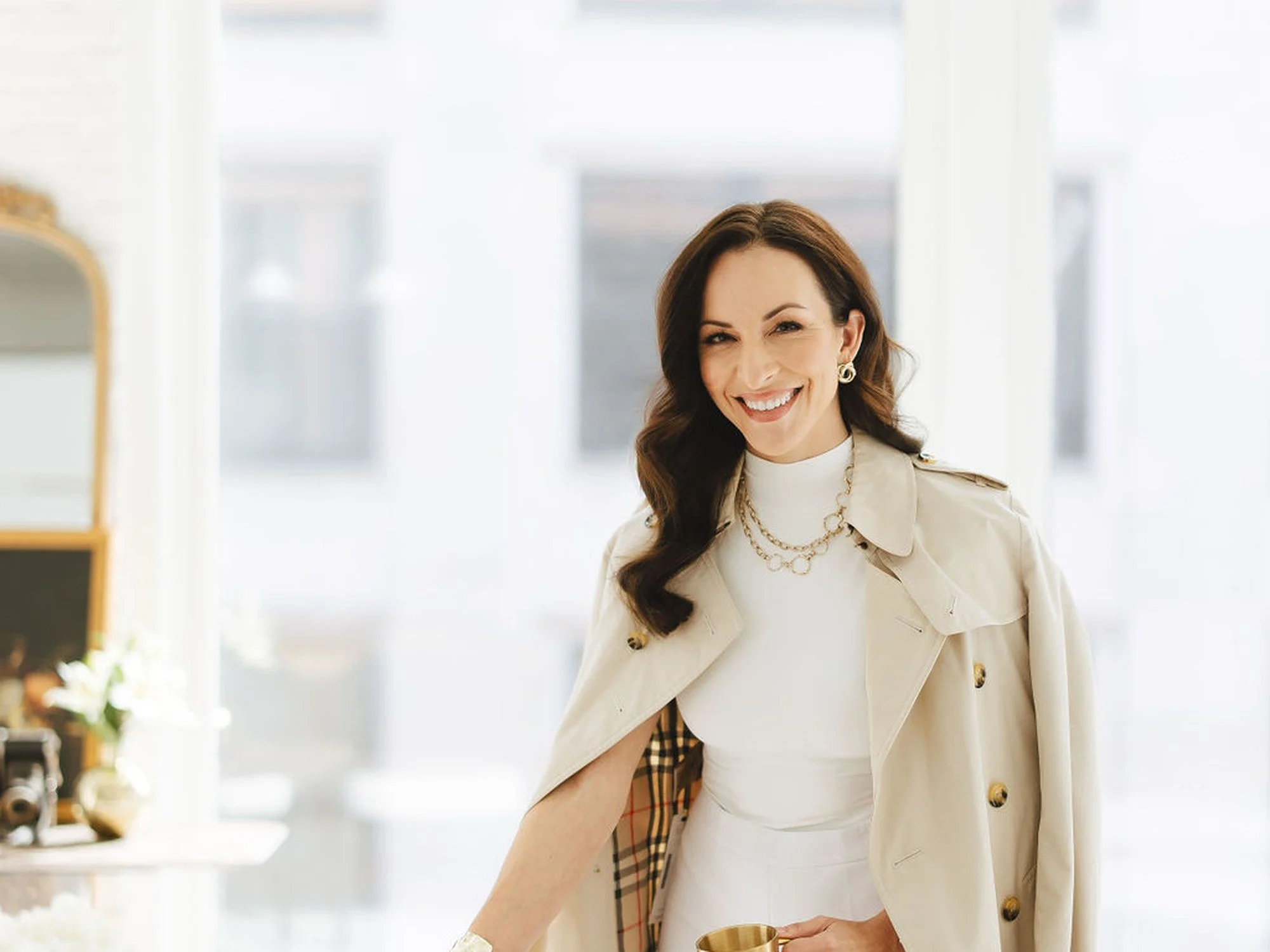 Dr. Brittany Dickinson, Chicago cosmetic dentist and Invisalign provider, in a Lakeview loft setting — Facially Driven Smile Design approach for Lincoln Park busy professionals.