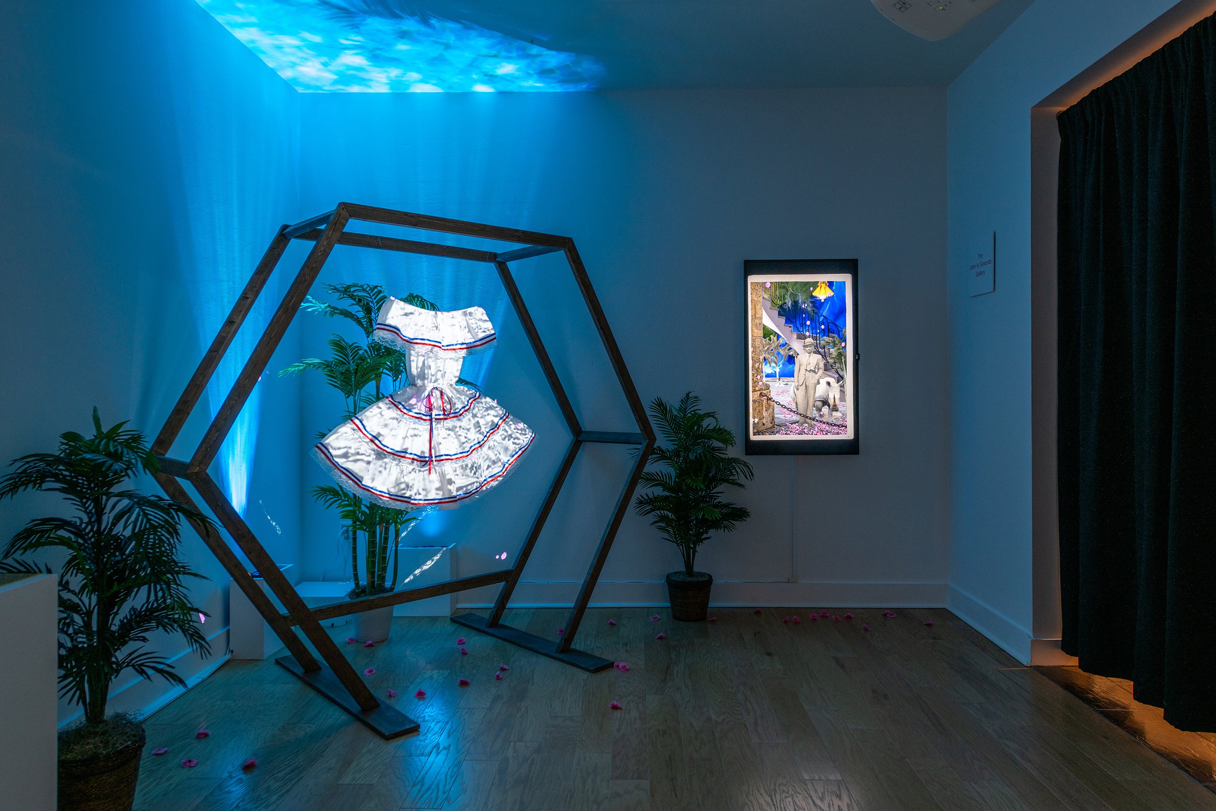 “In the Presence of Absence” by Allison Maria Rodriguez, video installation documentation at Fitchburg Art Museum, photo by Charles Sternaimolo