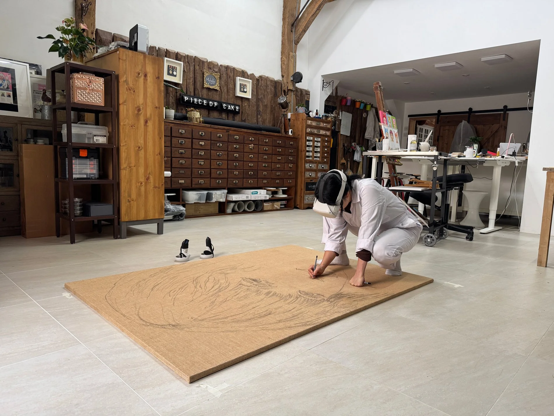 Michelle Wibowo uses a VR headset to transfer drawing of Taylor Swift to a canvas for her artwork