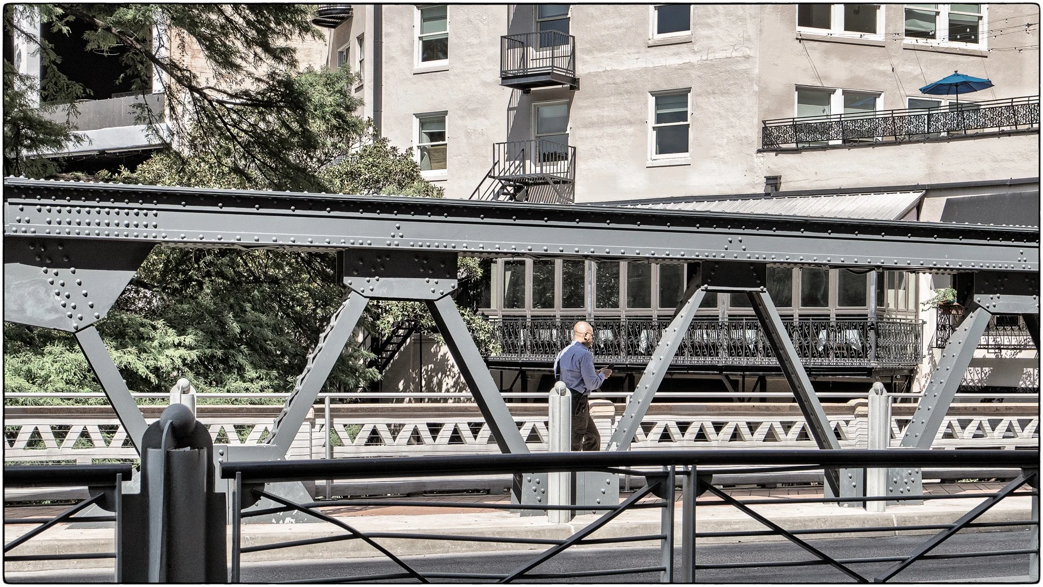 Crossing a downtown bridge in San Antonio.jpg