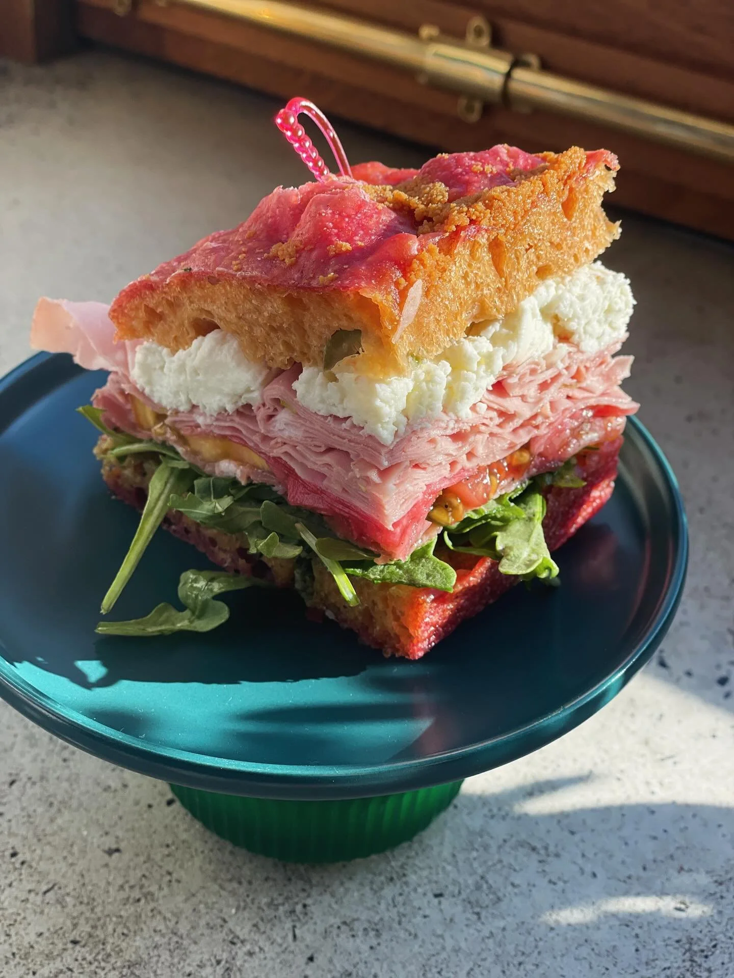 🥪 FRESH FOCACCIA FRIDAY!!!!! We have some tasty focaccia sliders made by our friend @kvlsvyhvrbst - Beet root olive focaccia with pesto, arugula, capocolo, mortadella, mozzarella, pickled radishes, heirloom tomatoes. COME GRAB EM!!