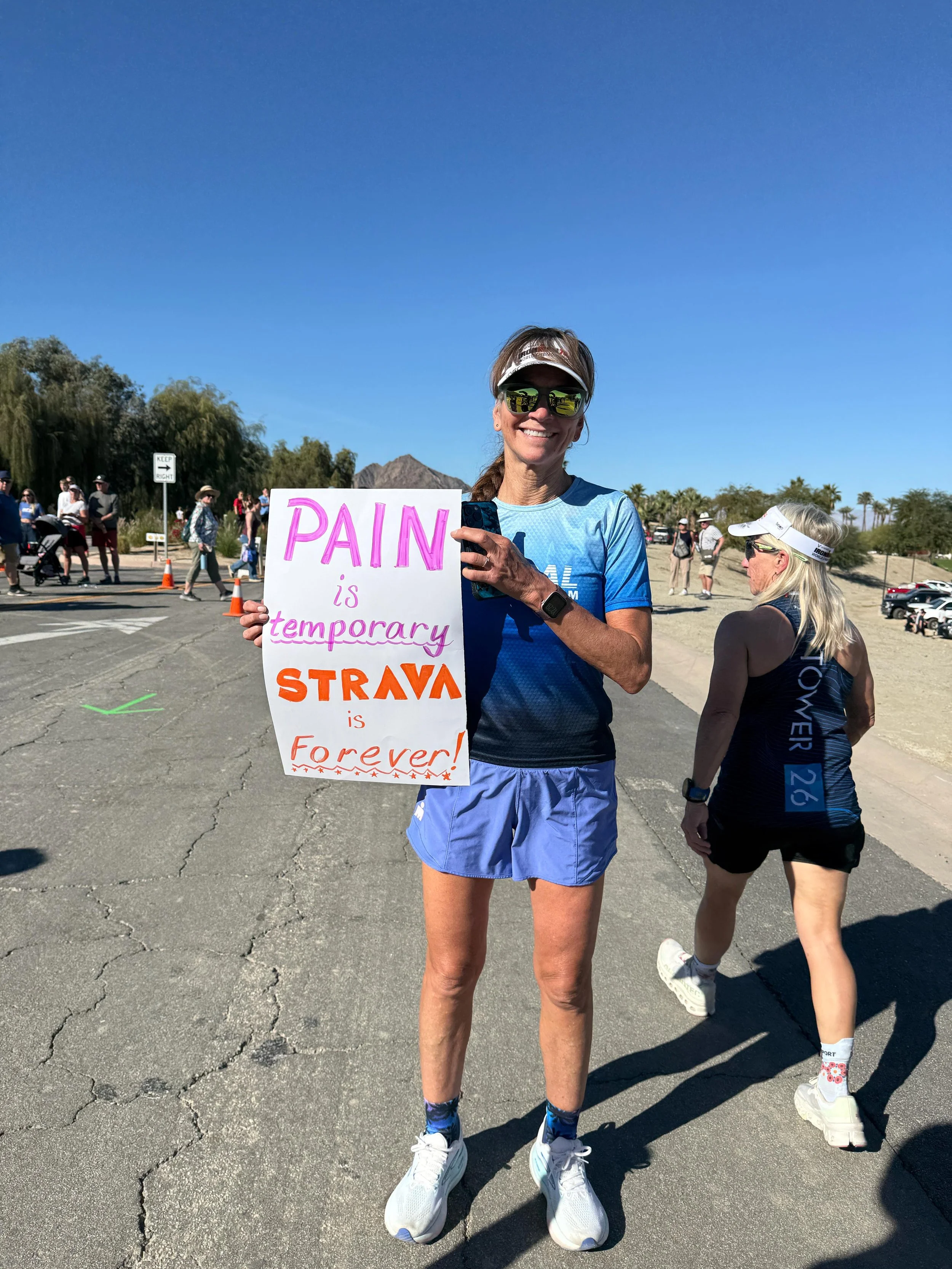Photo of Triathlon Team from Irvine, Orange County - Sherri cheering on the team at Ironman La Quinta 70.3
