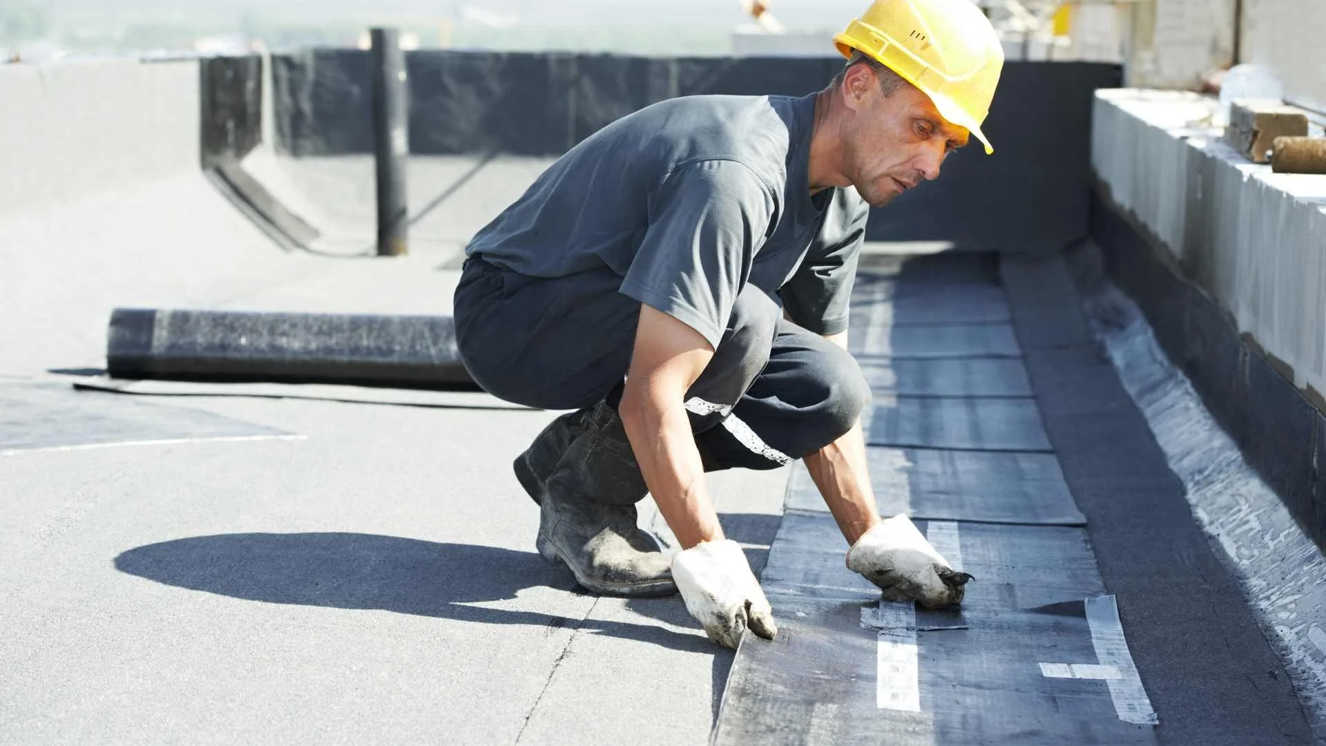 a roofer from montgomery working on a roof in alabama
