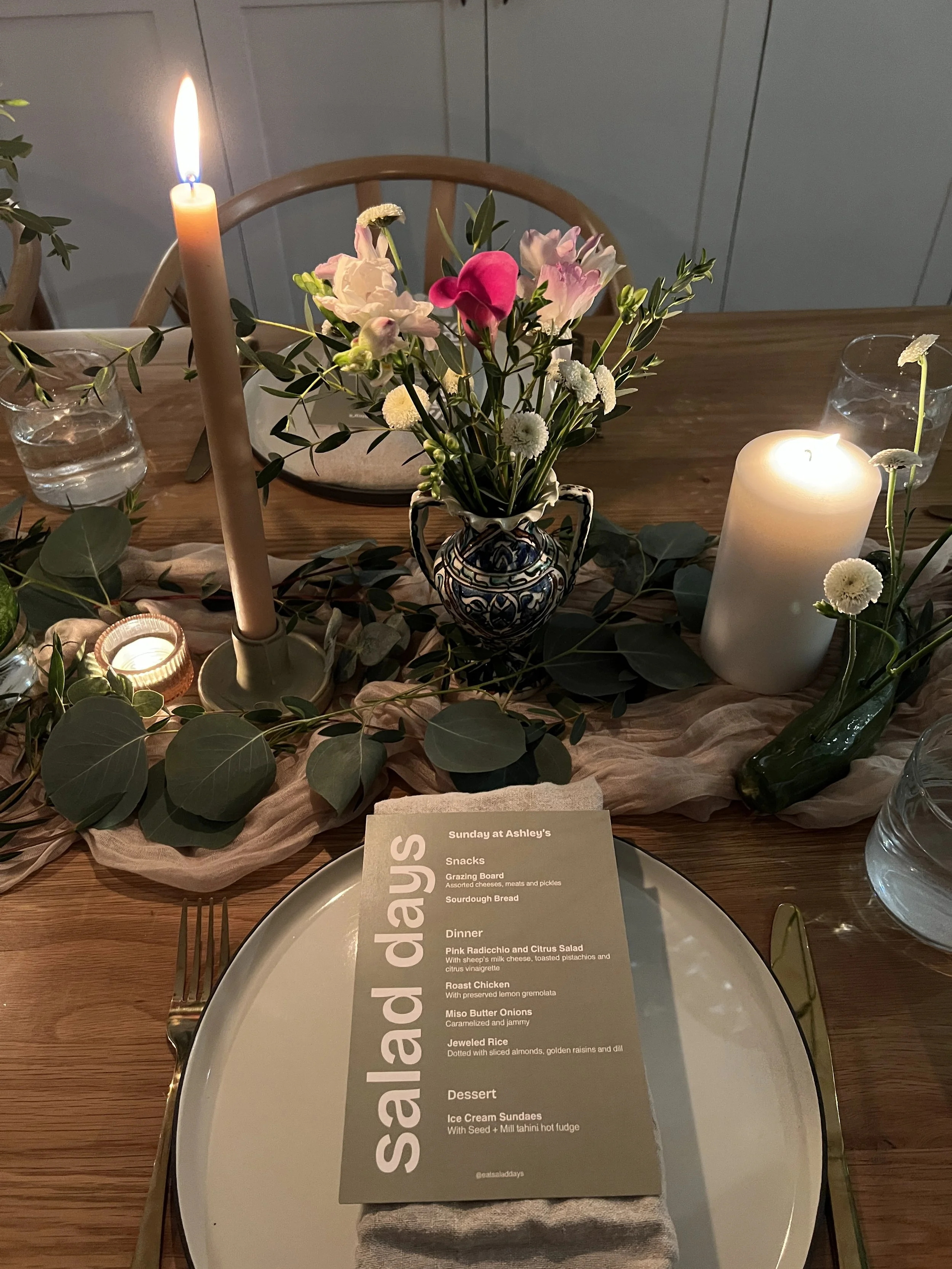 Candlelit dinner party with custom menu