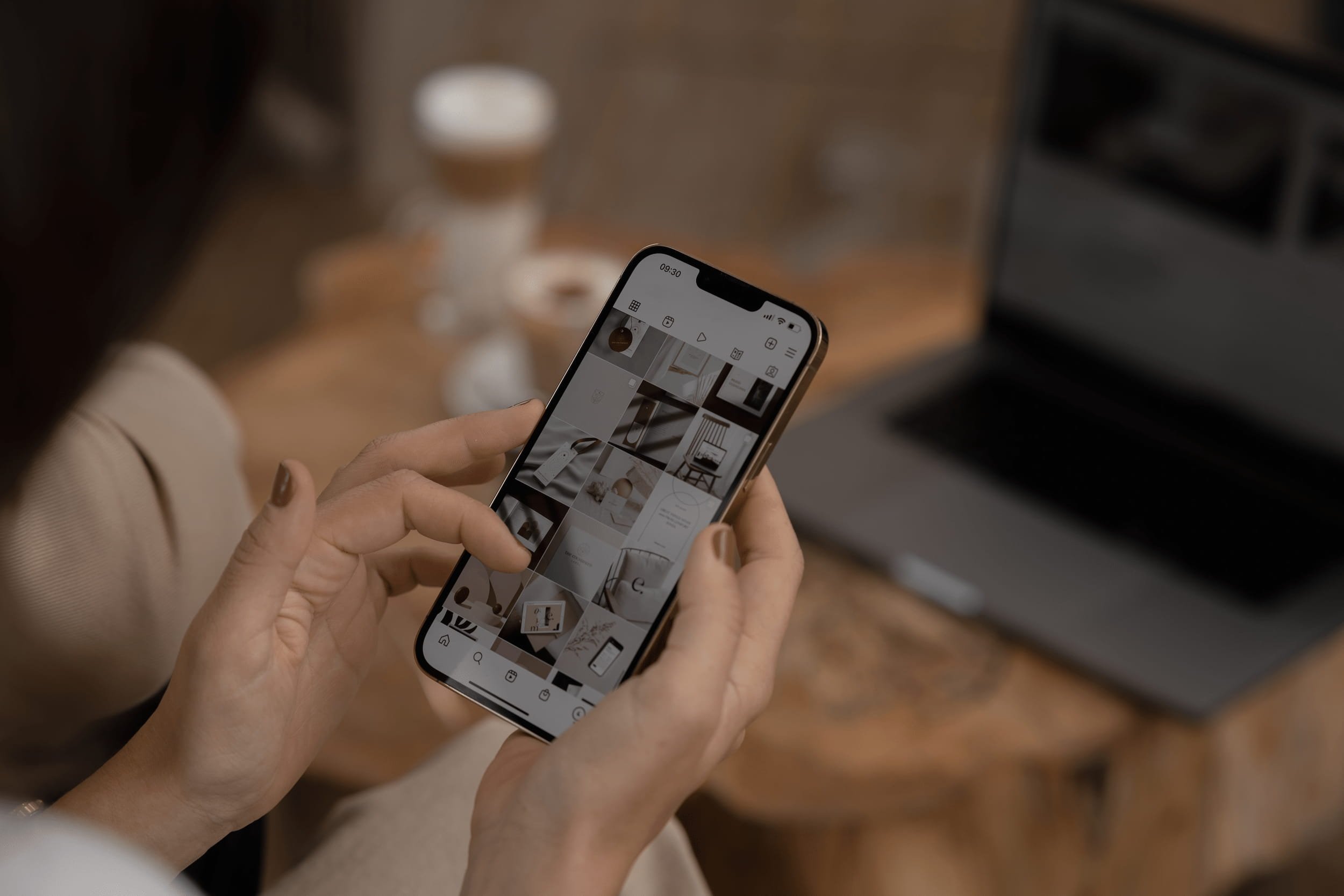 Person scrolls through a coherent Instagram profile with aesthetic image content - content marketing through design & photography