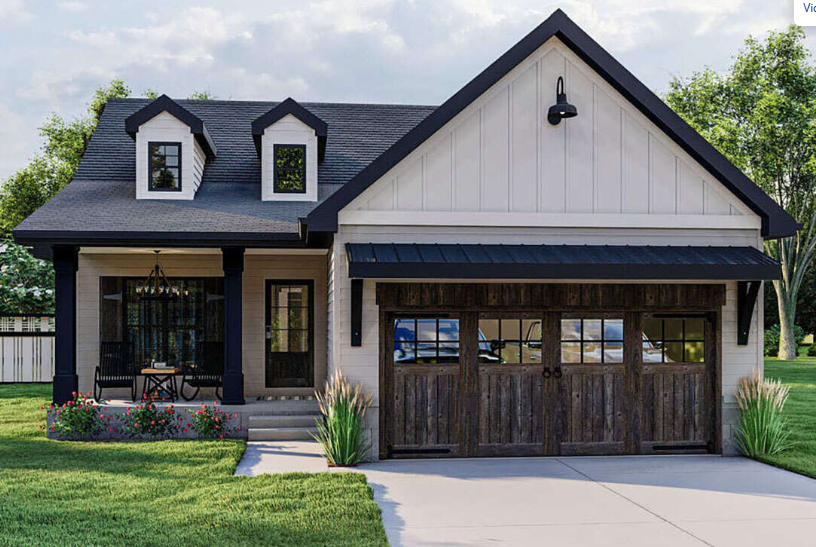 Modern farmhouse-style house with a gable roof, wood garage doors, front porch with seating, and landscaped yard with green grass and plants.