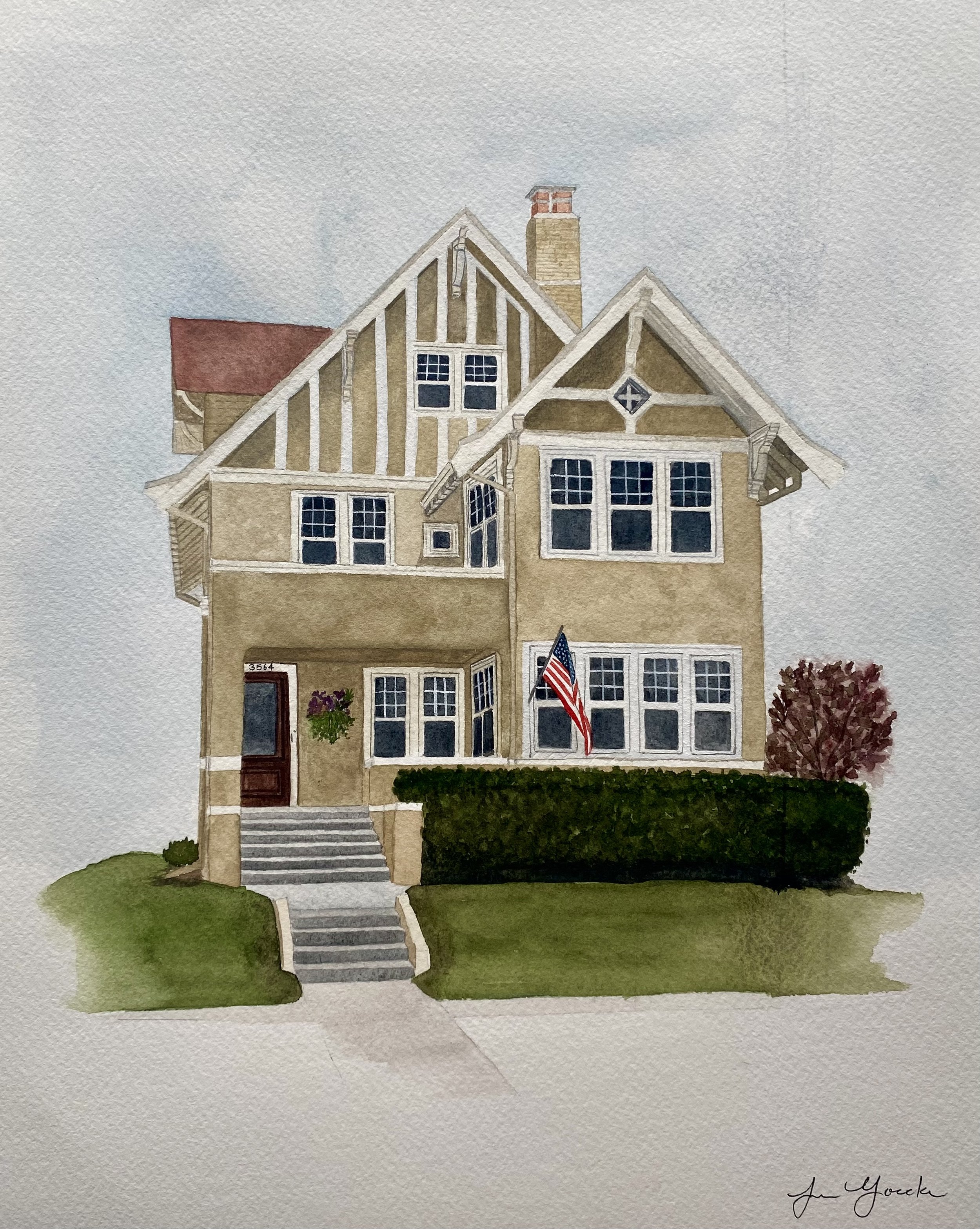 Watercolor painting of a two-story house with a gable roof, American flag, shrubs, and front steps.