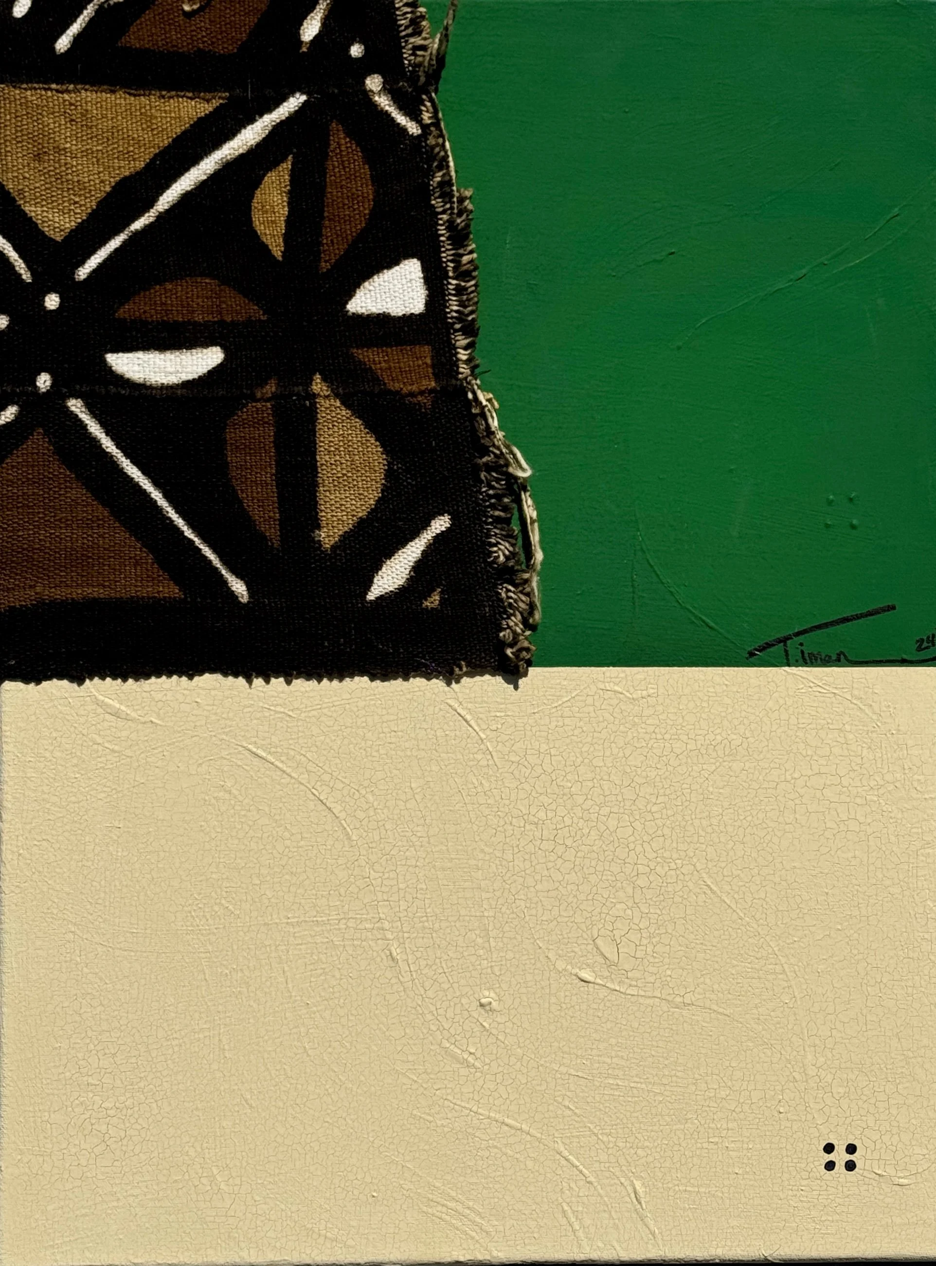 Abstract artwork featuring a geometric pattern on fabric with black, brown, and white shapes, contrasted by a green and beige textured background. African fabric.