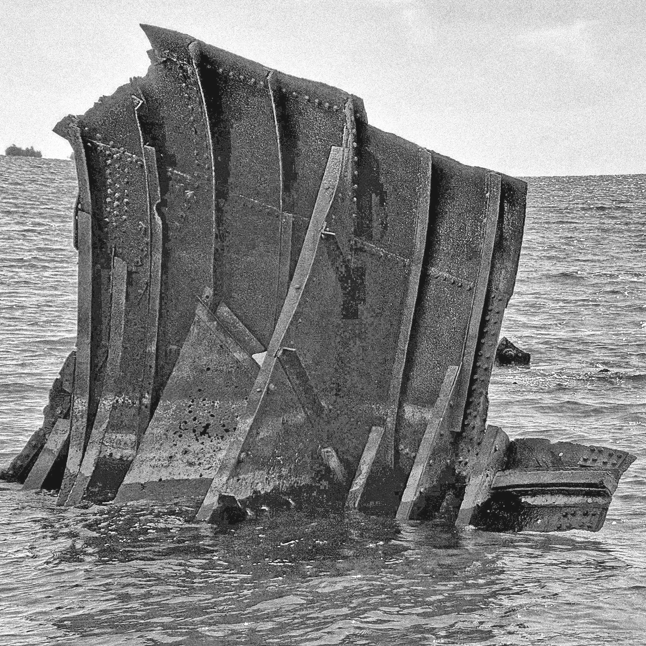 Steel ribs rise from Lake Huron like a forgotten monument