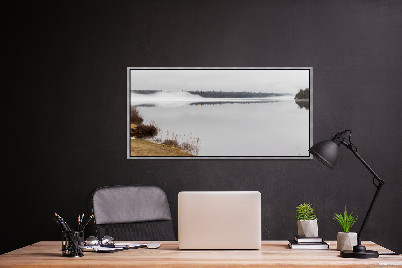 Pictorem Office setting display photo with a desk, chair, black wall and a large, framed Kenogami Lake on it.