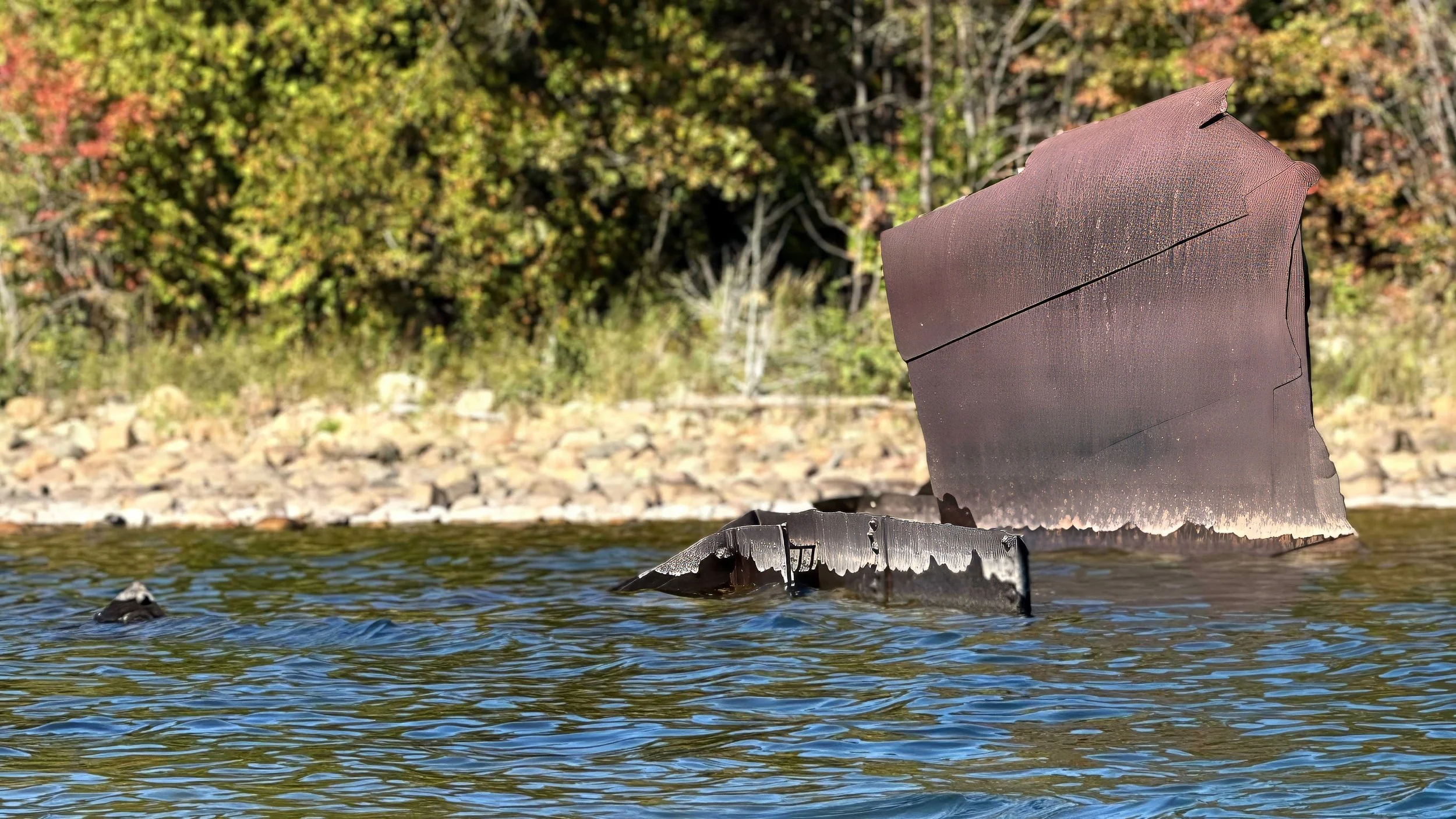 Old, large, pieces of metal that belonged to something sunk off the shoreline of Lake Huron.