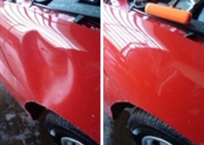 Large dent removal on a vehicle.