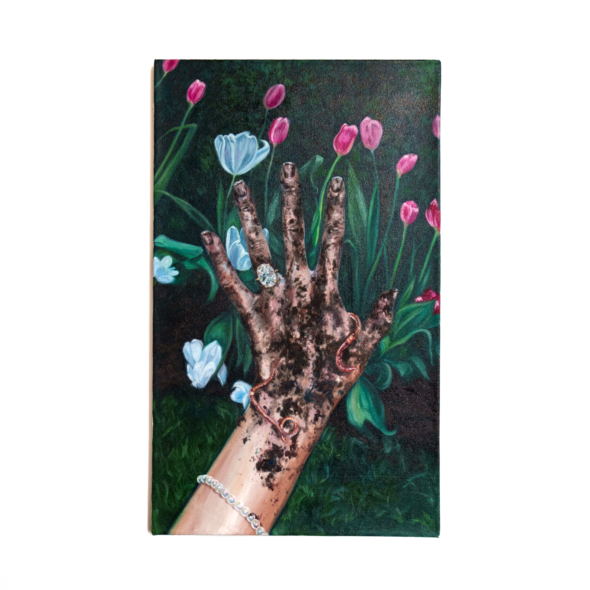 Painting of a hand with dirt and worms, adorned with rings and a pearl bracelet, among pink and white tulips and green foliage.