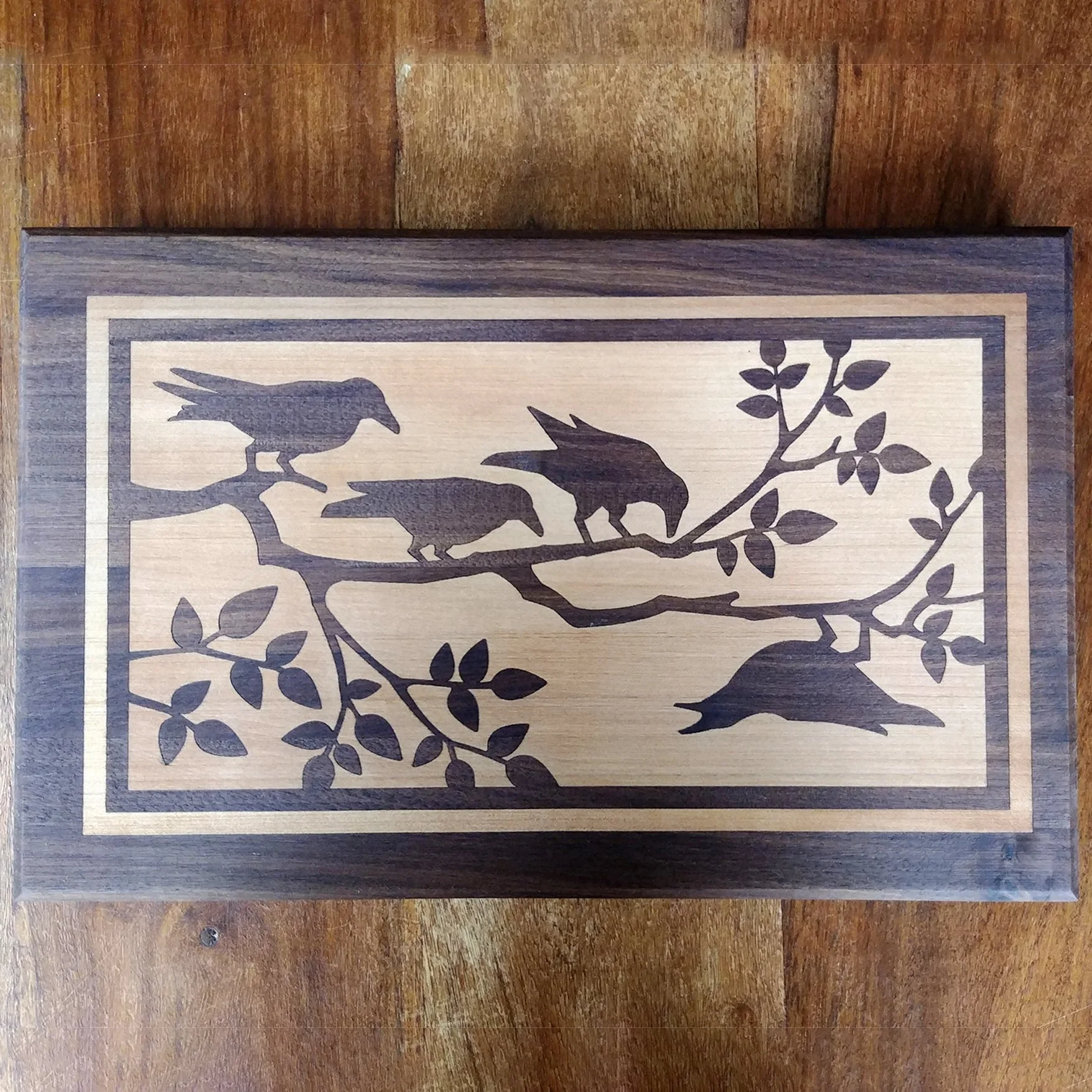 Walnut Cuttingboard Yellow Cedar Inlay Ravens.jpg
