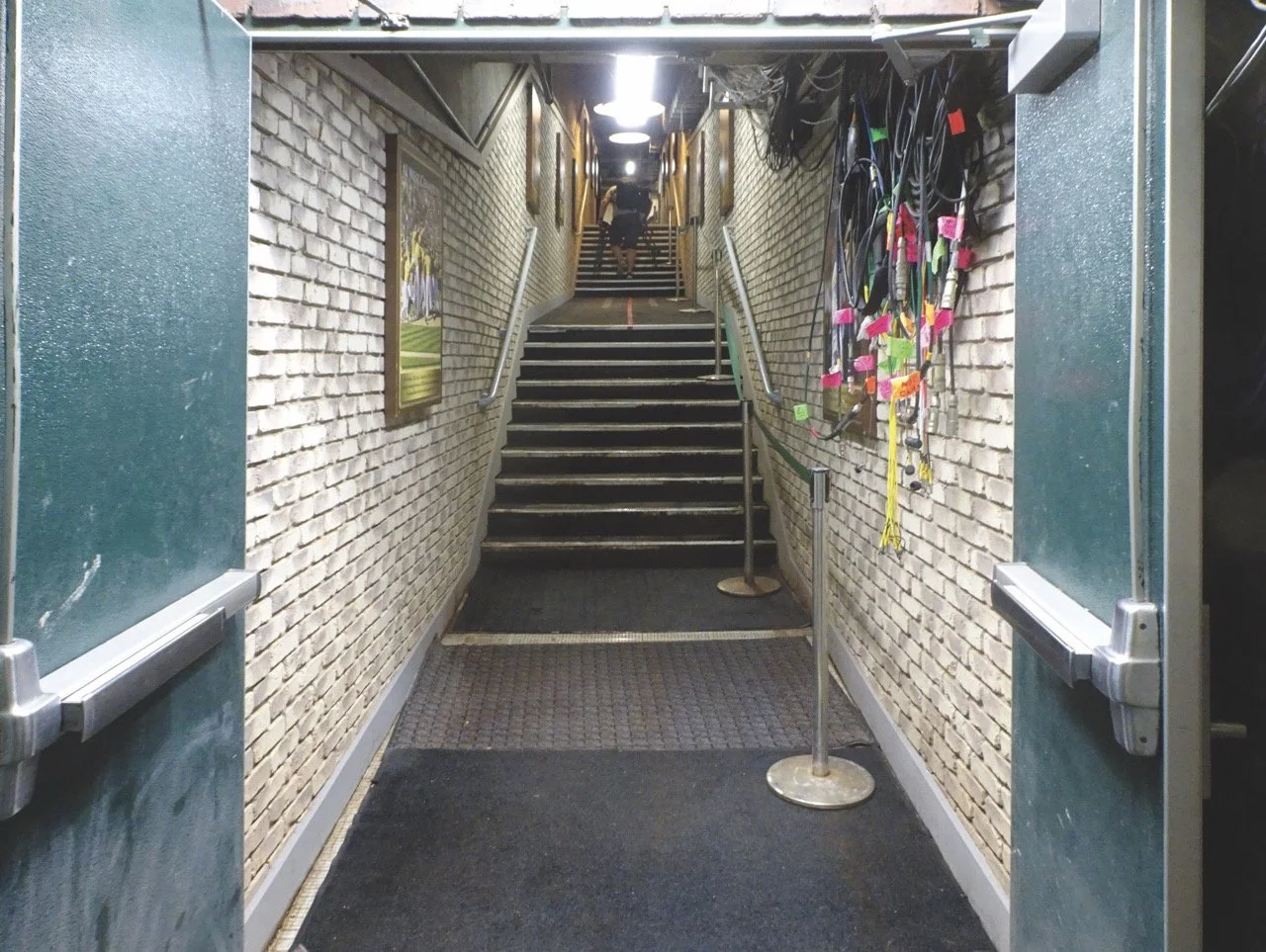  Walking UP the Tunnel&nbsp;– Players and fans are greeted with a LOT of cable and a skinny hallway when going up towards the visitor’s clubhouse as well as the exits for fans.&nbsp; 