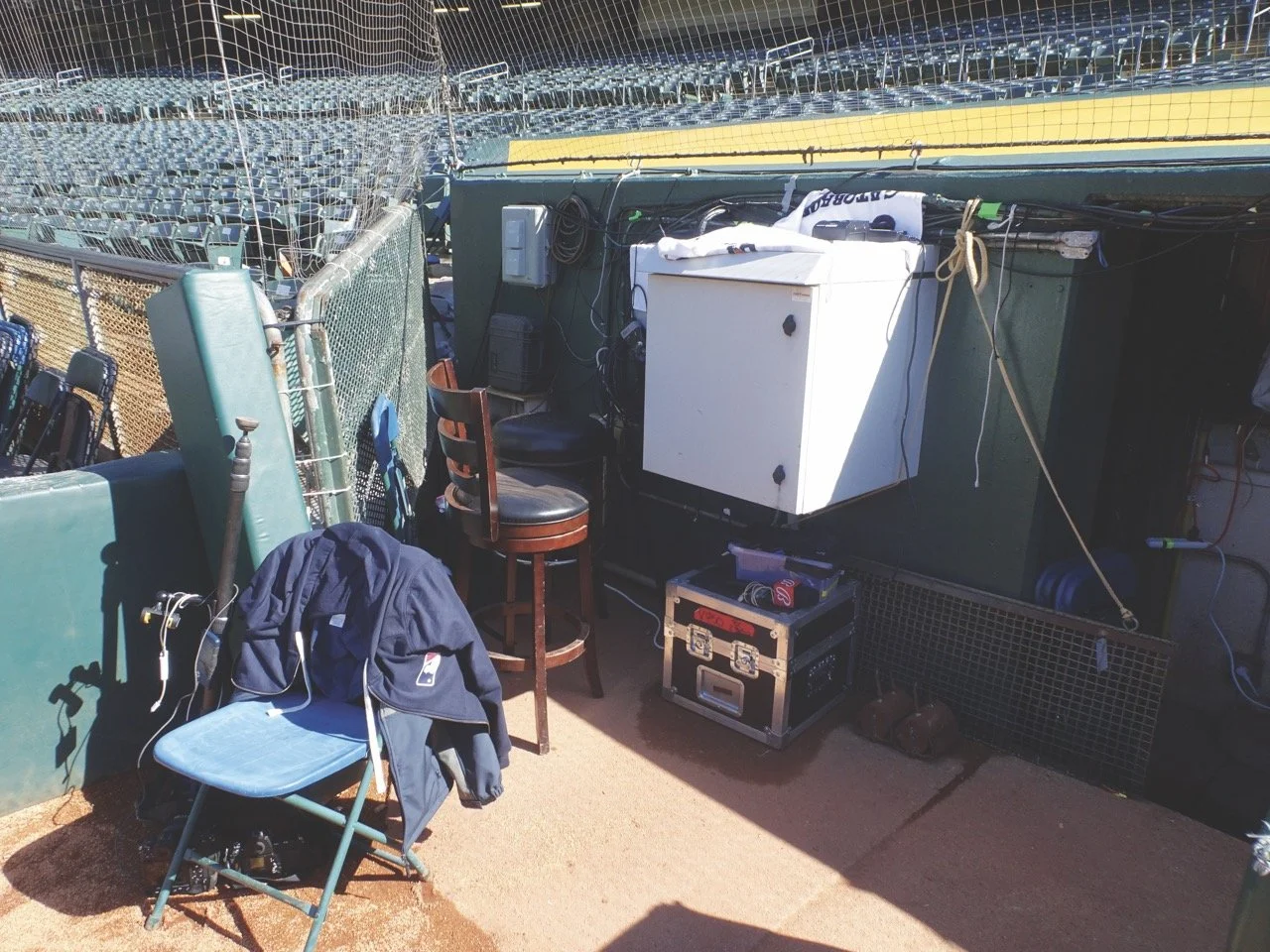  The View OF My Seat&nbsp;– The visiting TV reporter’s seat at the Oakland Coliseum is at the very back of this area, tucked into the corner of the triangle and behind that big white box!&nbsp;&nbsp;Sitting on an uncomfortable folding chair, it was a