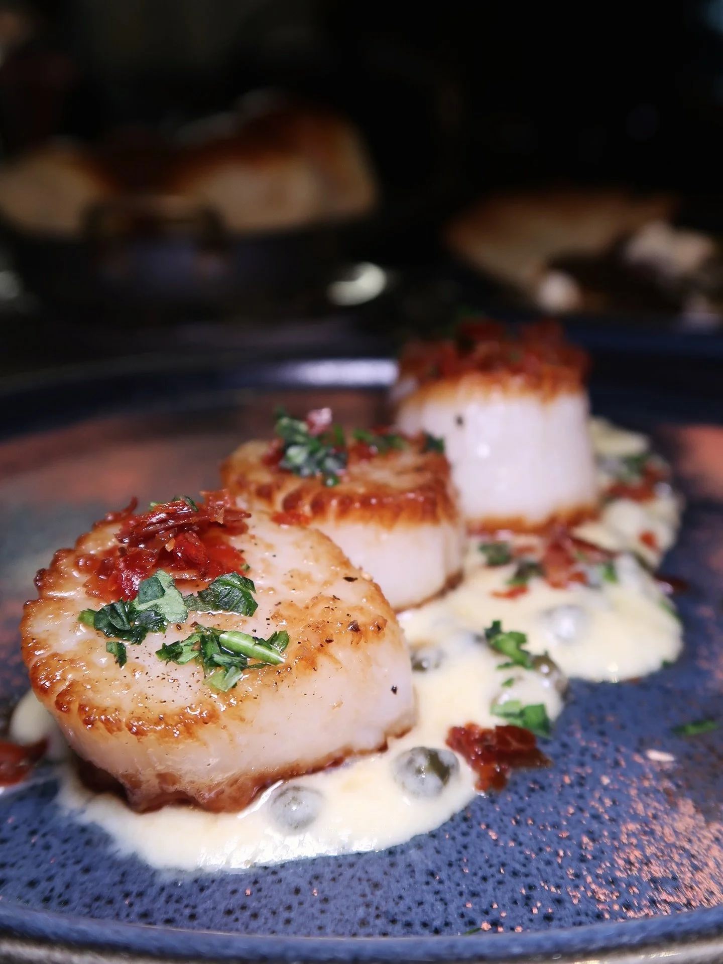 Alaska Seared Scallop Piccata&mdash;
AK U10 Scallops, lemon-caper beurre blanc, fresh parsley, crispy prosciutto, tomato dust.

Your journey at Stalk begins with our thoughtfully crafted starters. Designed to awaken the palate and set the tone for wh
