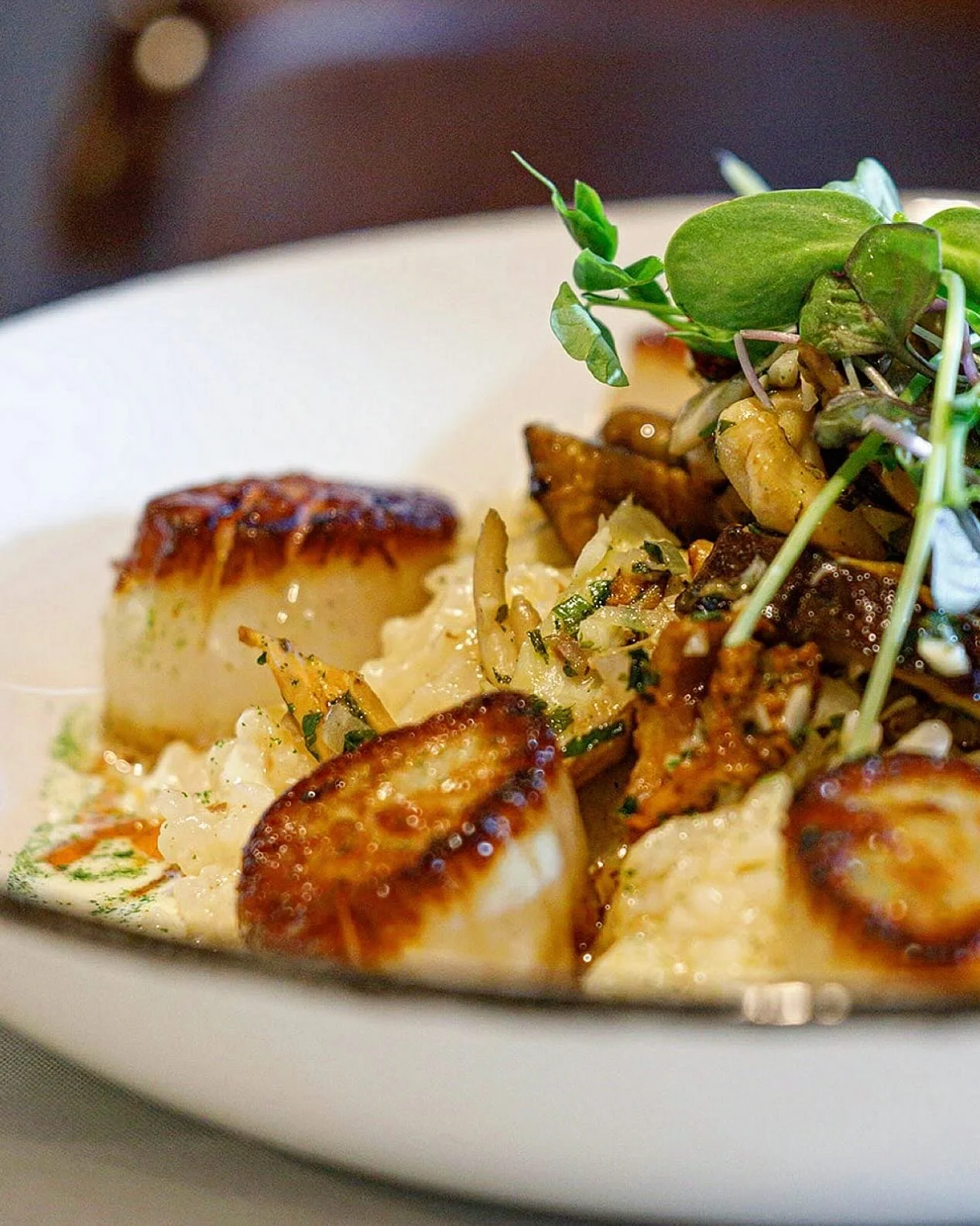 Although we&rsquo;re known for our steaks, word on the street is our seafood will blow you away. With scallops that melt in your mouth and sides that steal the show&mdash;

&bull; AK Scallops &amp; Parmesan Risotto &bull;
seared ak u10 + wild mushroo