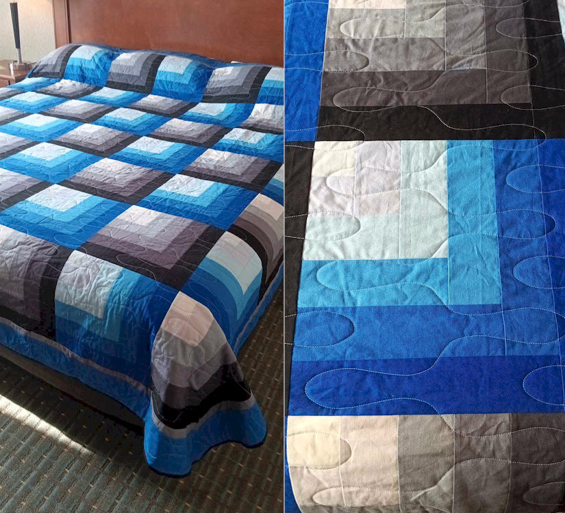 Quilt: Subtle stitch pattern and thread color on bold geometric top