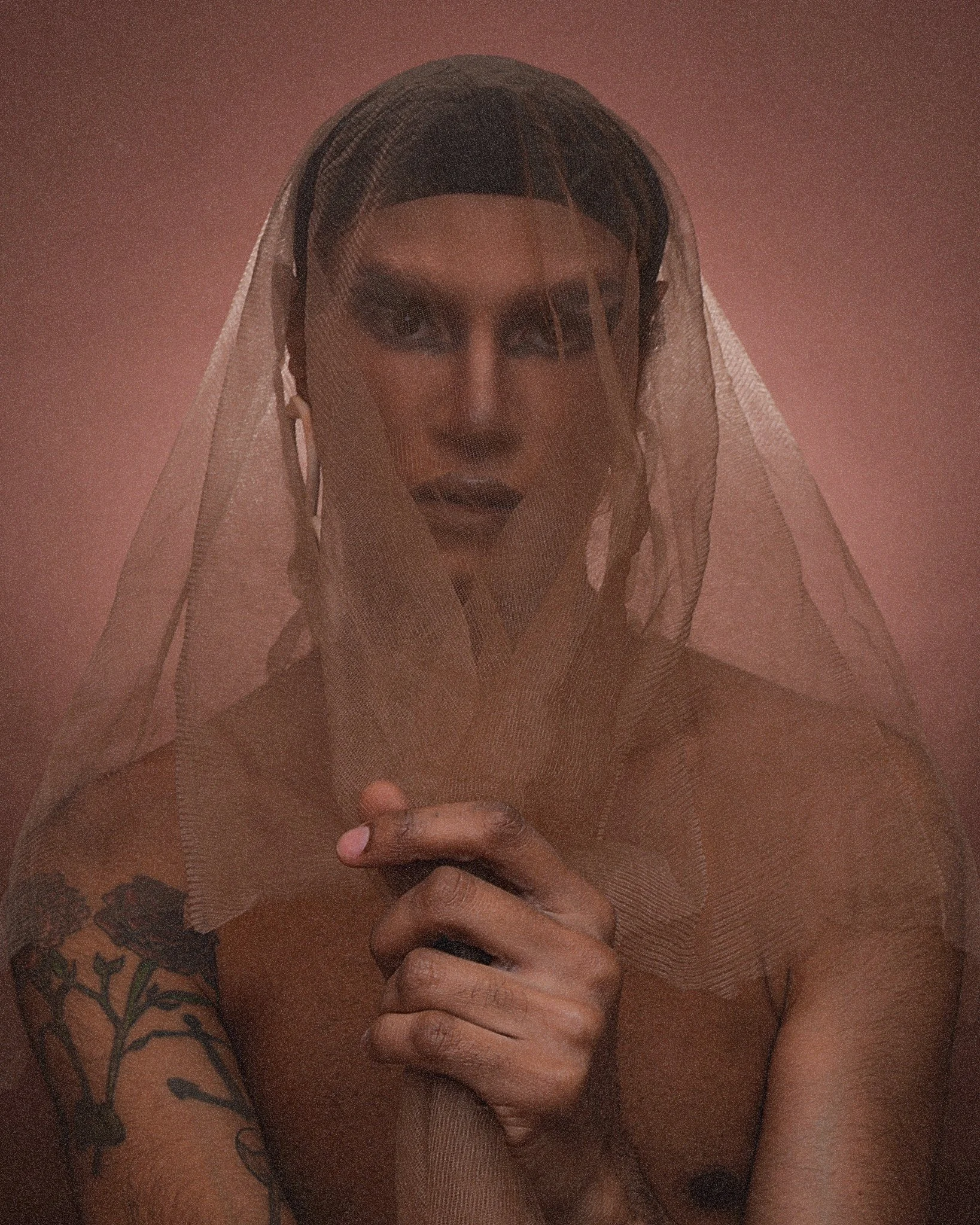 Image of Voxigma Lo wearing a a sheer fabric with soft lighting taken on digital