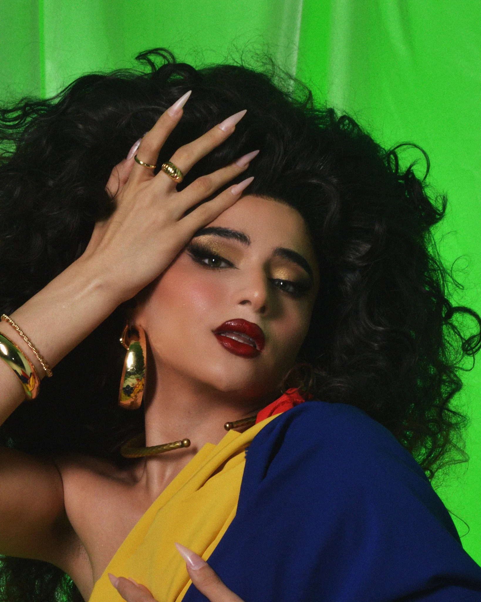 Image of drag artist Danielle Darling shot on a green background shot on film