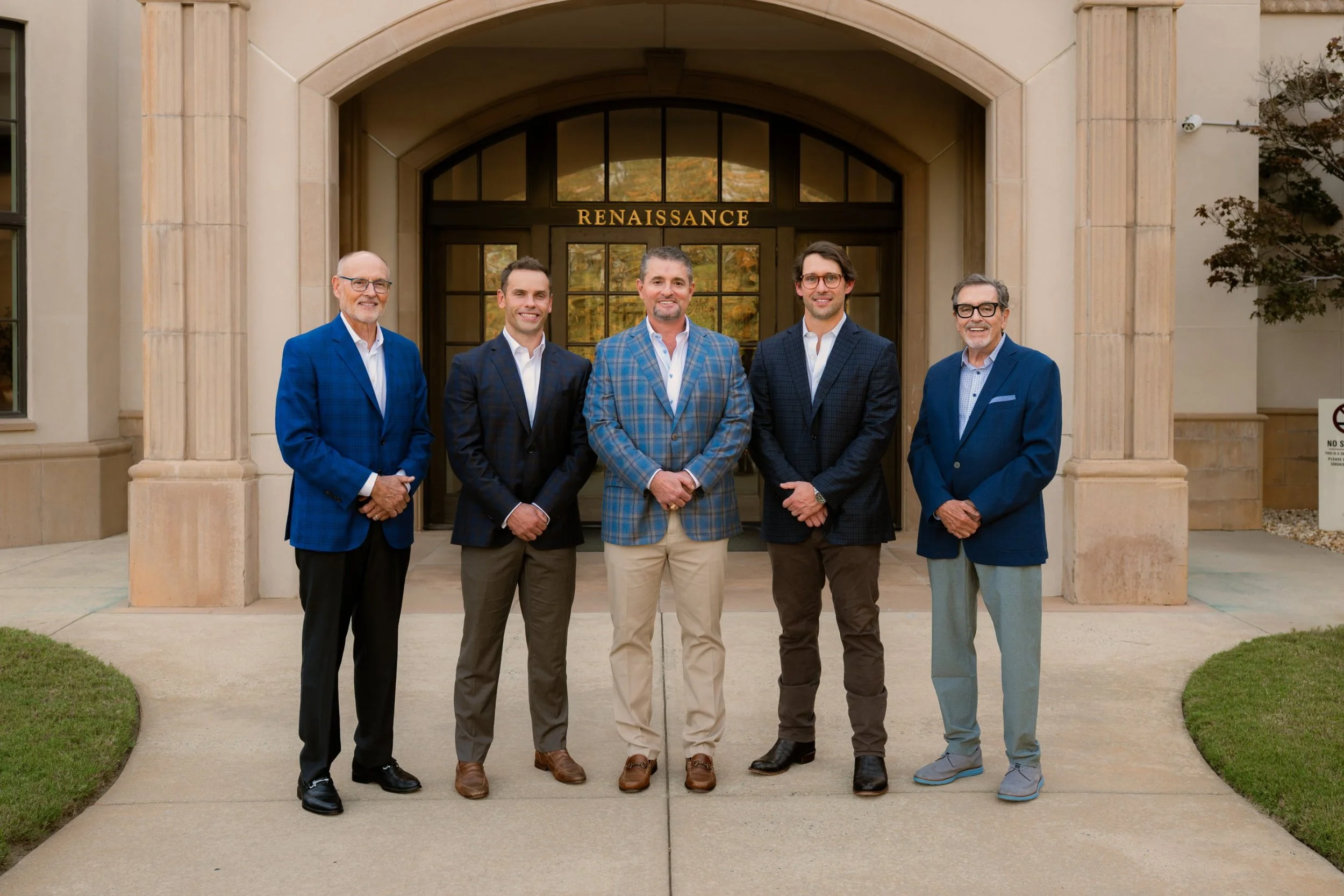 Renaissance Plastic Surgery surgeons standing outside the Renaissance office entrance