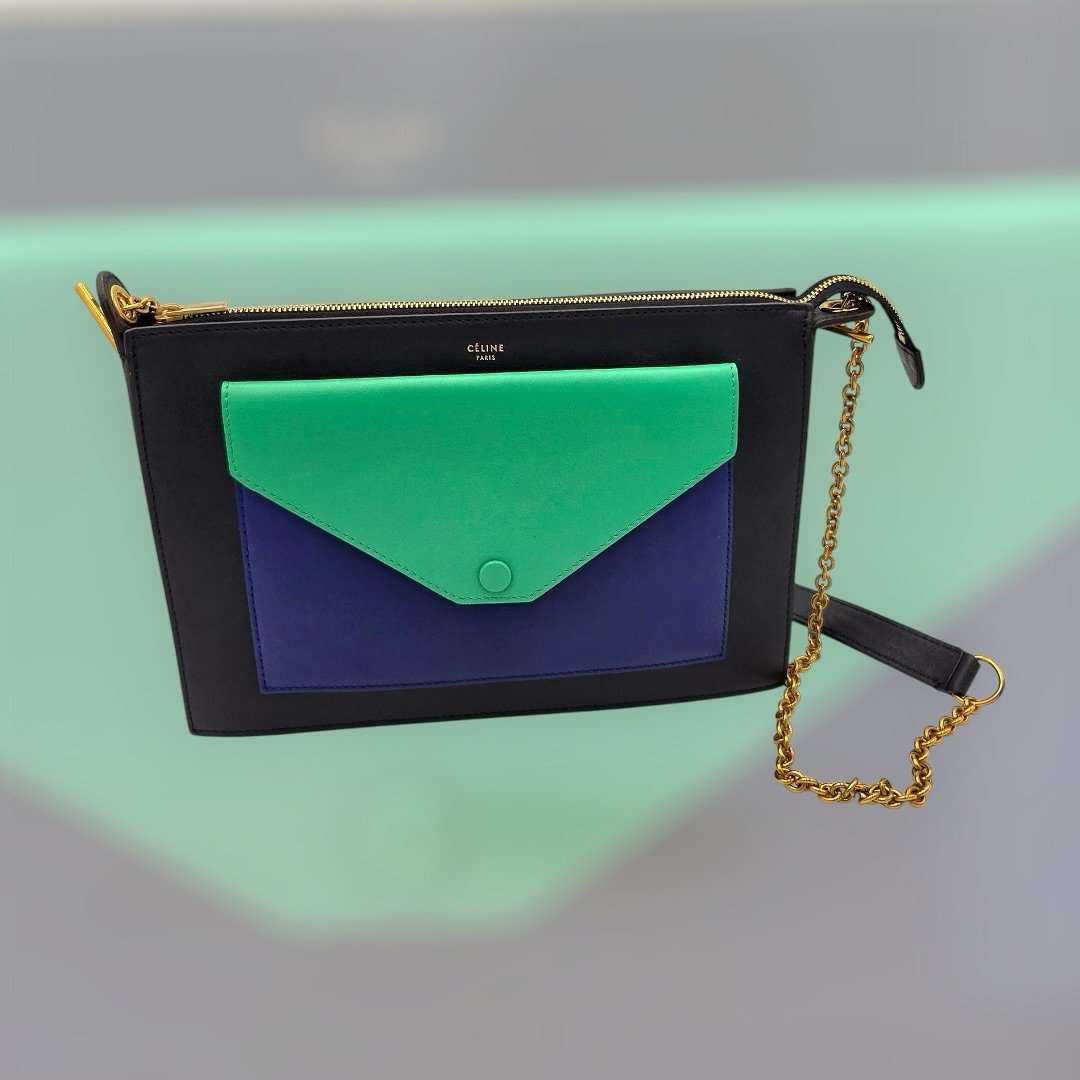 Bold, chic, and impossible to ignore.✨ This stunning Celine crossbody brings colorblock style to the next level with sleek black, blue, and green leather, gold-toned hardware, and a luxe chain strap.

Made in Italy. Excellent condition. Comes with FR