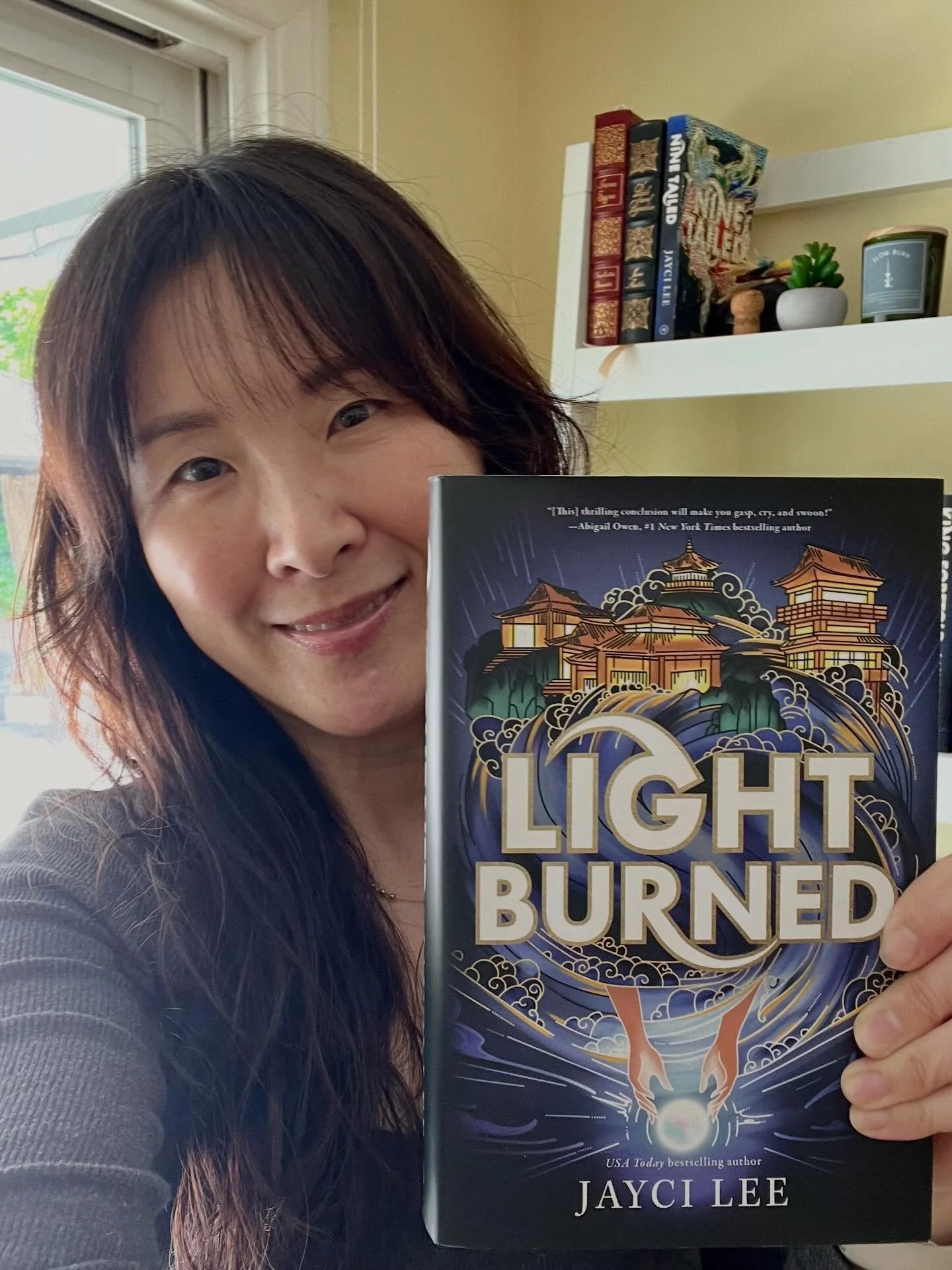 My book baby no. 15 is here! 🥹🥹🥹

Light Burned is the final book in the Realm of Four Kingdoms trilogy, with Nine Tailed (book 1) and King Foretold (book 2) preceding it.

I wrote this Korean mythology romantasy series because I wanted to explore 