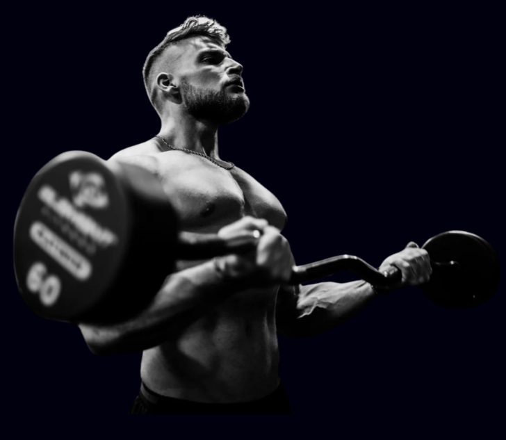 A muscular man with short dark hair and tattoos on his arm, flexing his biceps against a black background.