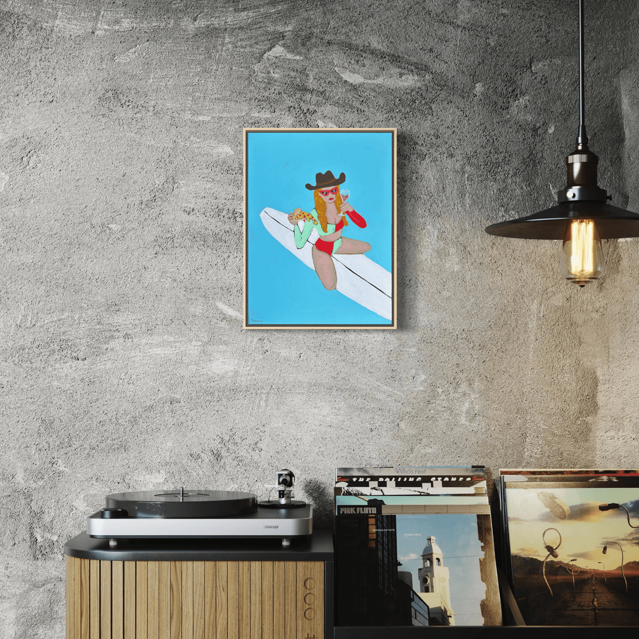 Pizza and Wine’ original cowgirl and surf painting by Temma Lee hanging on a wall, 40 x 30cm, framed in natural timber