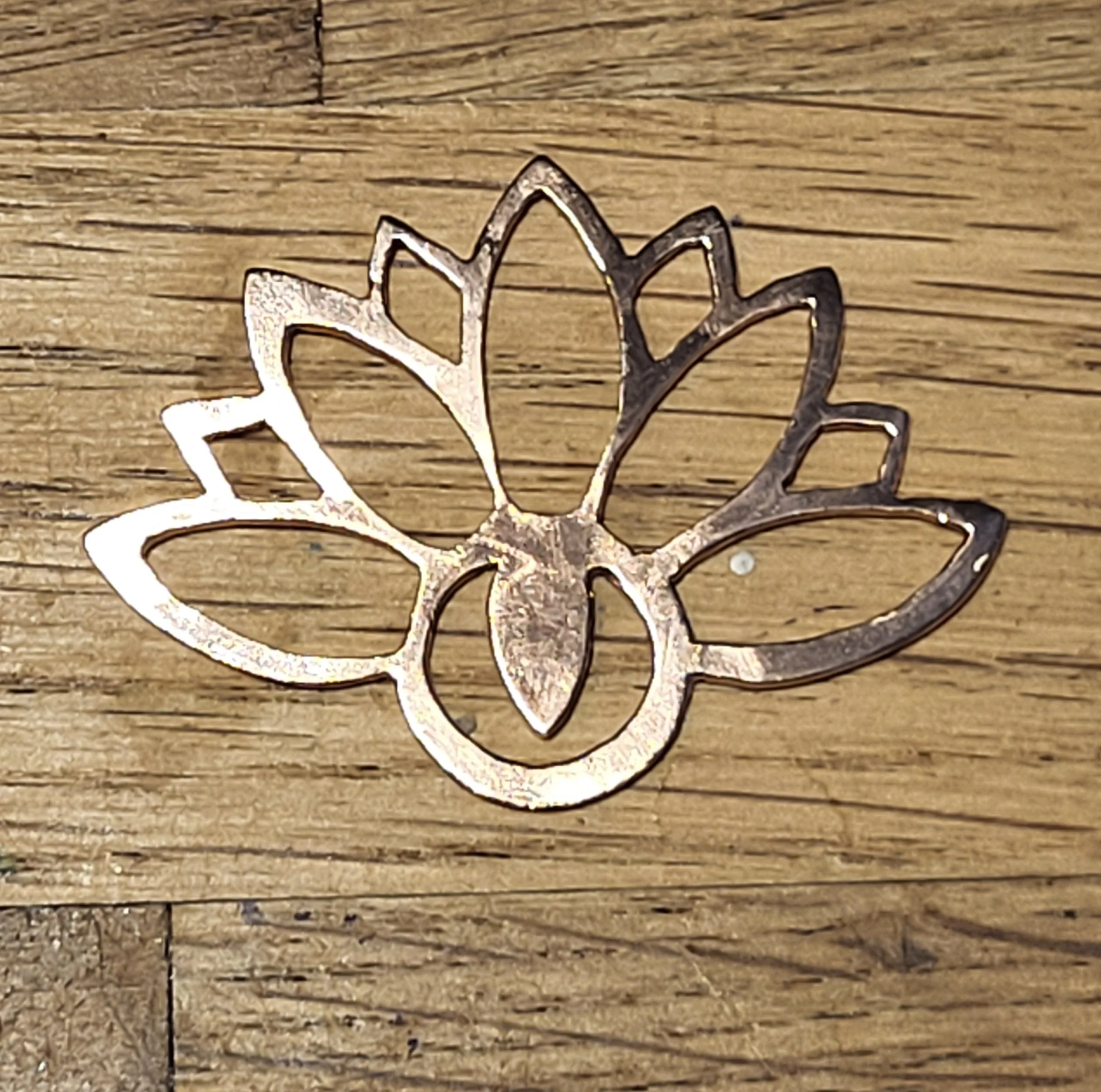 Lotus flower cut out of copper sheet