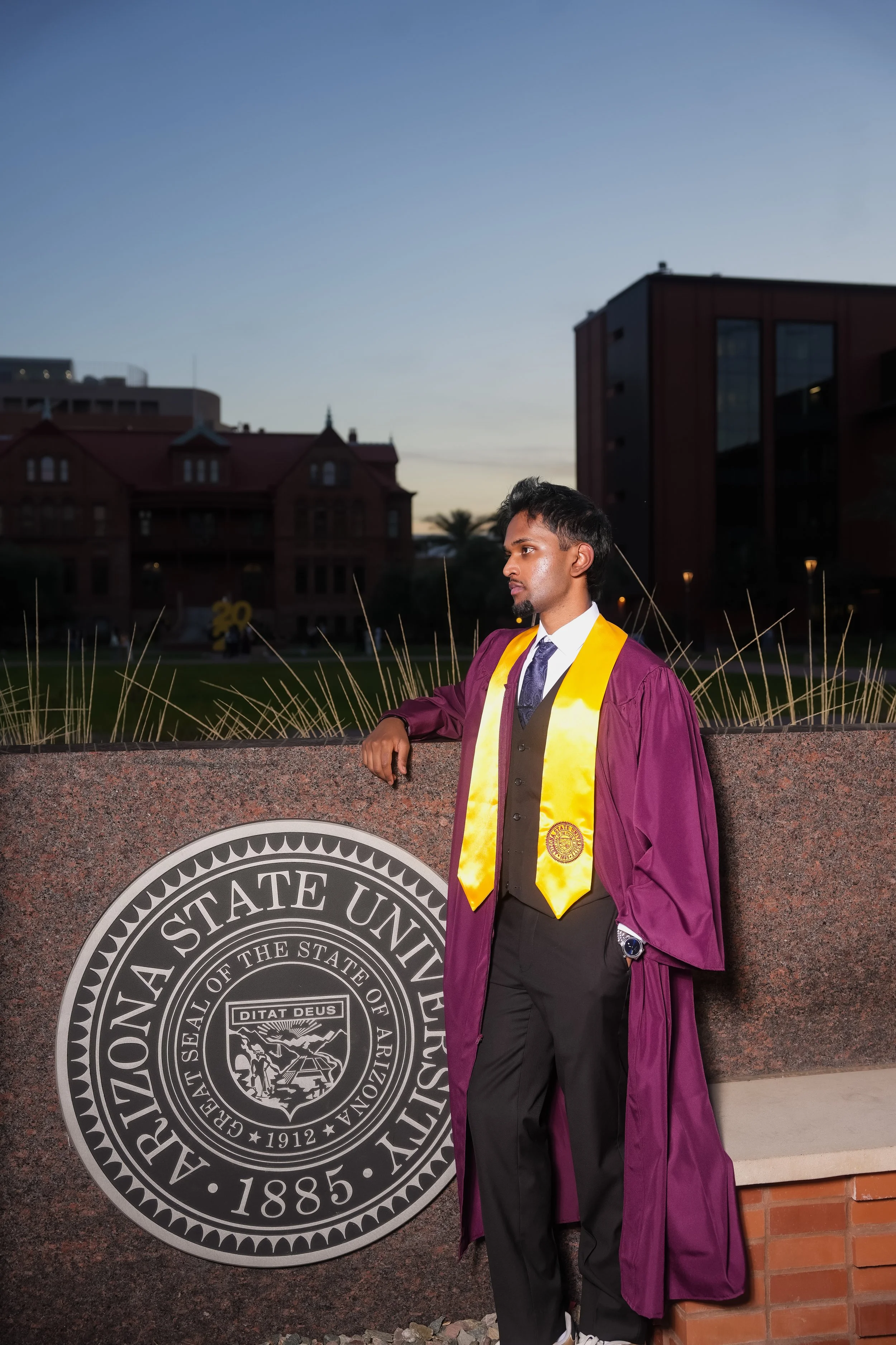 Group posing in front of Arizona State Sign