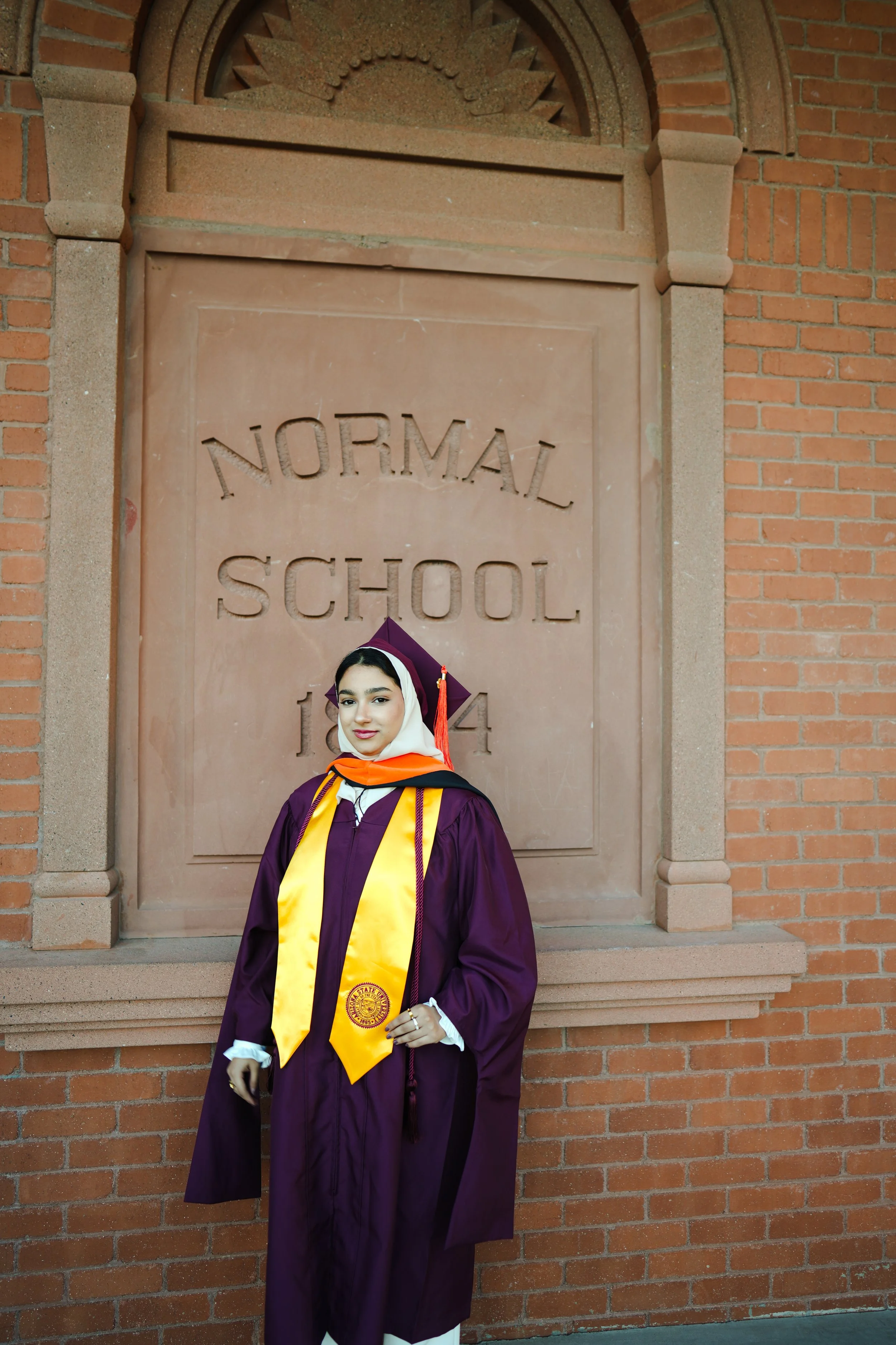 White Male graduating at Old Main ASU