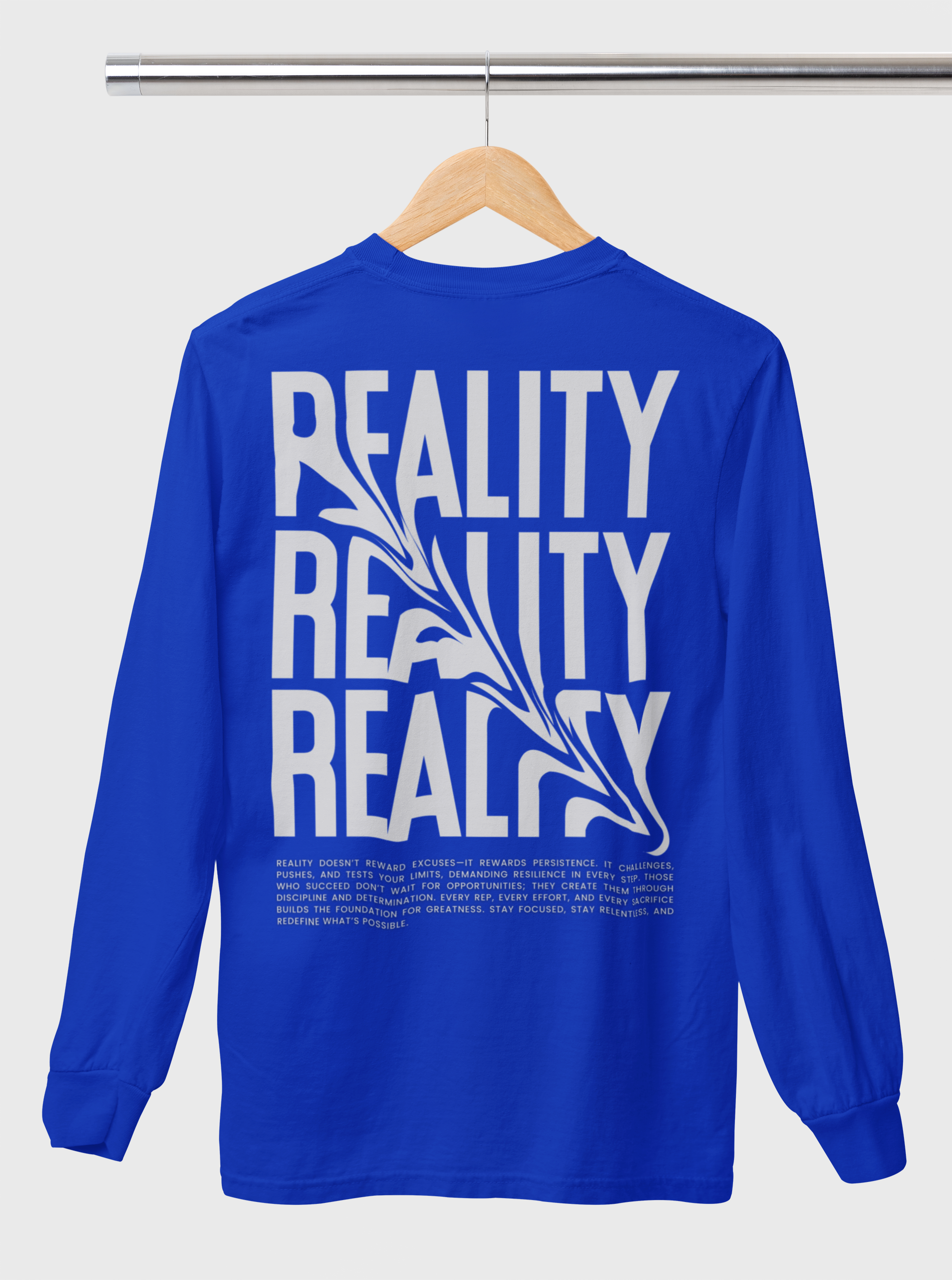 mockup-of-a-comfort-colors-long-sleeve-tee-with-customizable-sleeves-hanging-in-a-studio-m52779.png
