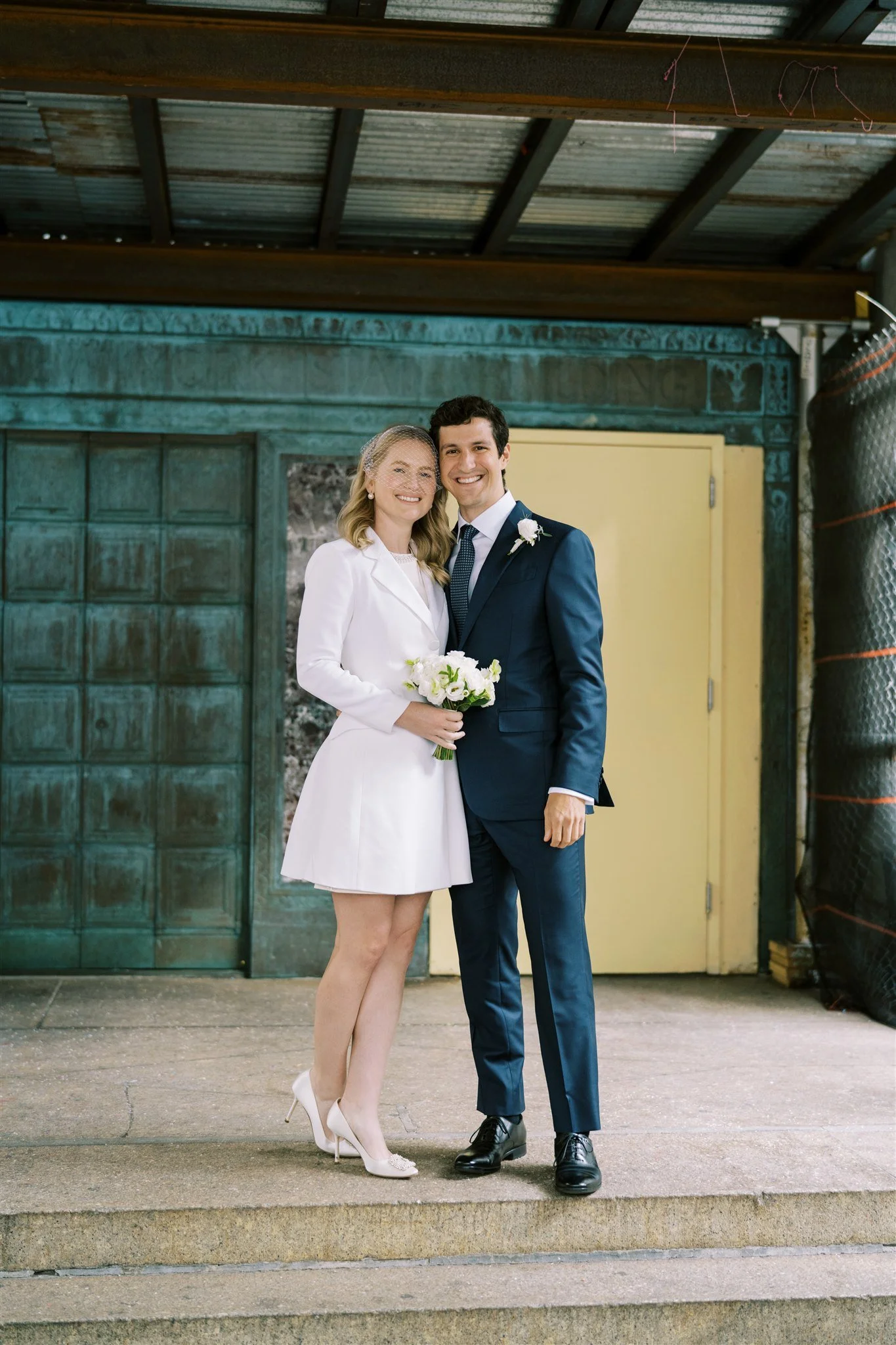 Timeless portrait of the couple on the courthouse landing. michelle rago destinations wedding planner nyc.