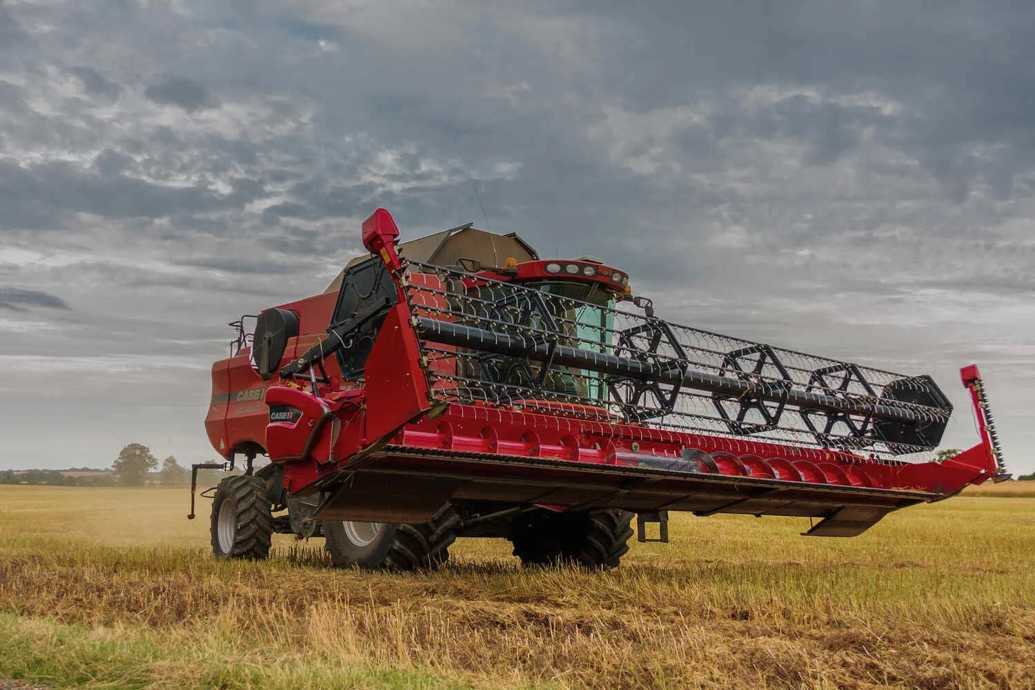Red Case Combine Harvester 7120 Axial Flow with cutting head raised UK