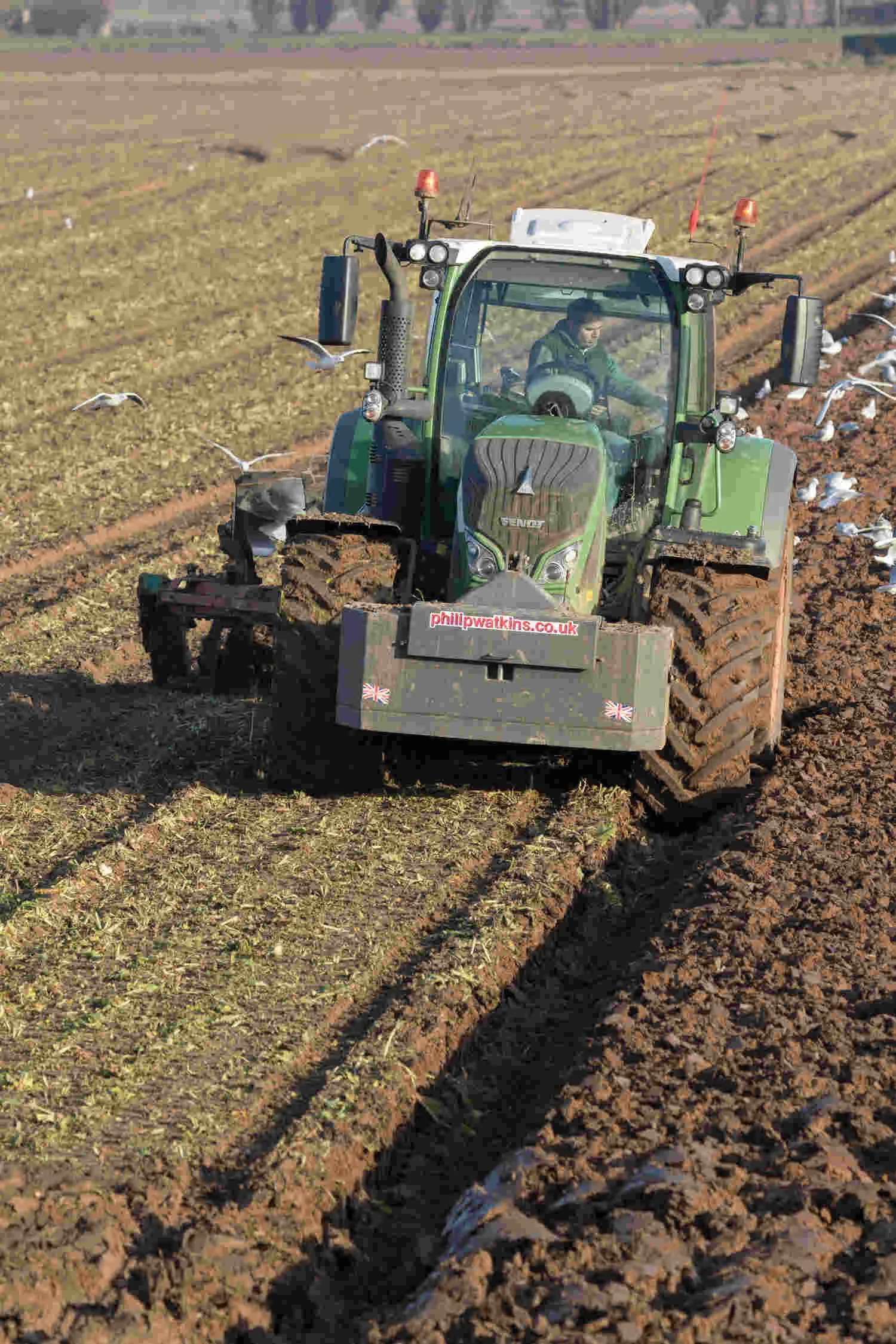 Stock photos of Fendt, 724, Vario tractor ploughing.