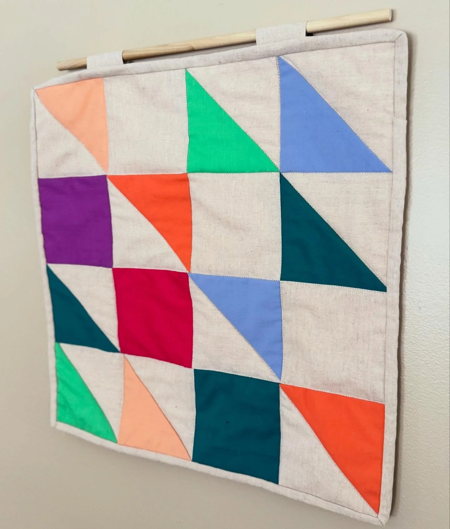 I was inspired by @mister.larrie to bring more color into my work at this dark time. This wall hanging was made as Minneapolis has been occupied by federal forces who are operating from darkness. To me, this wall hanging represents the people of Minn