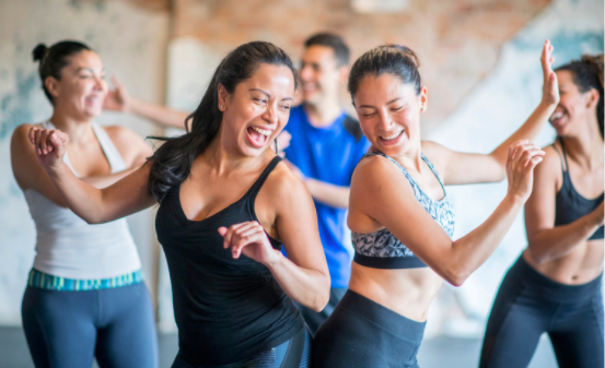 Friends enjoying yoga together.