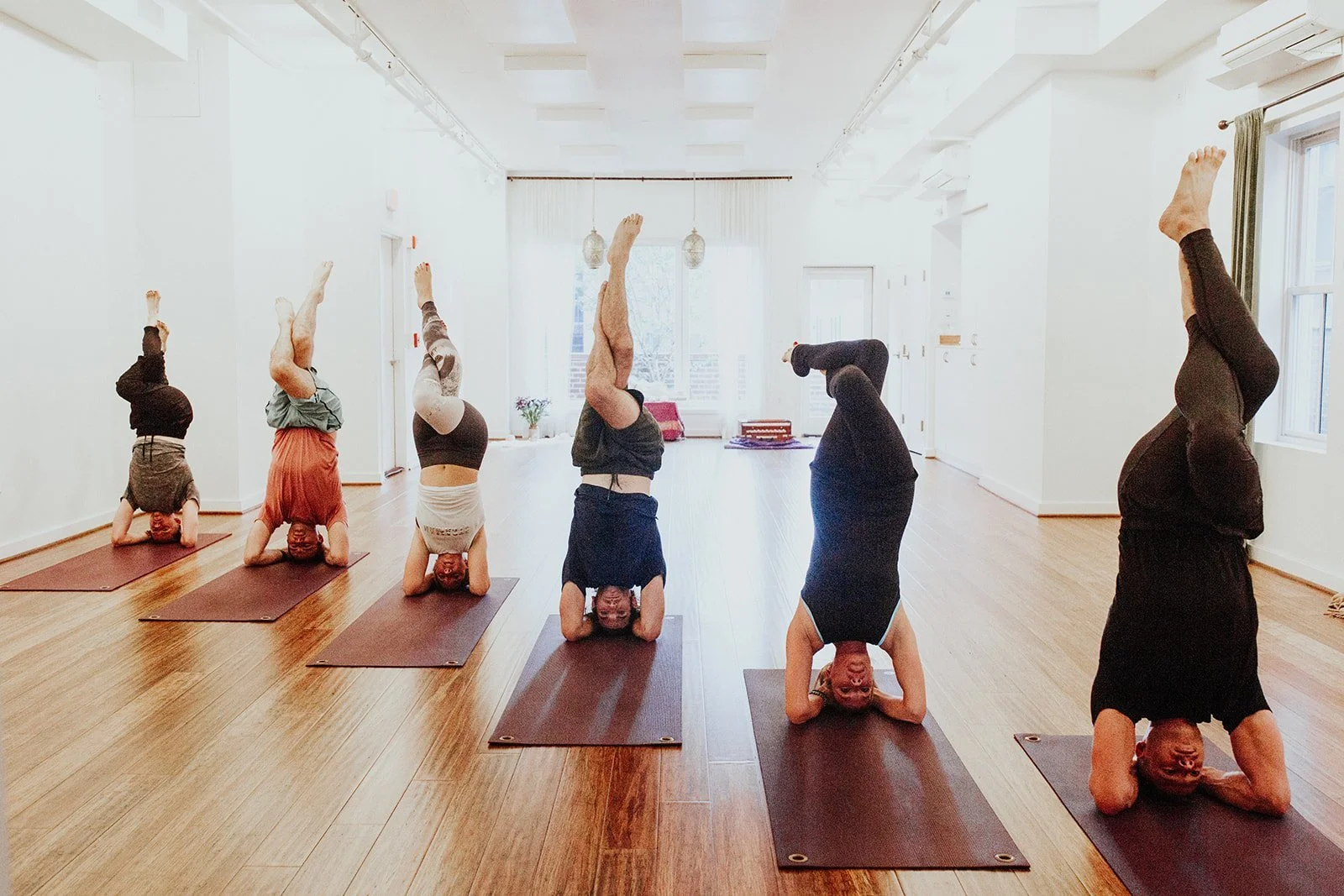 Practicing Yoga In A Group Setting Is Fun And....Good For You!