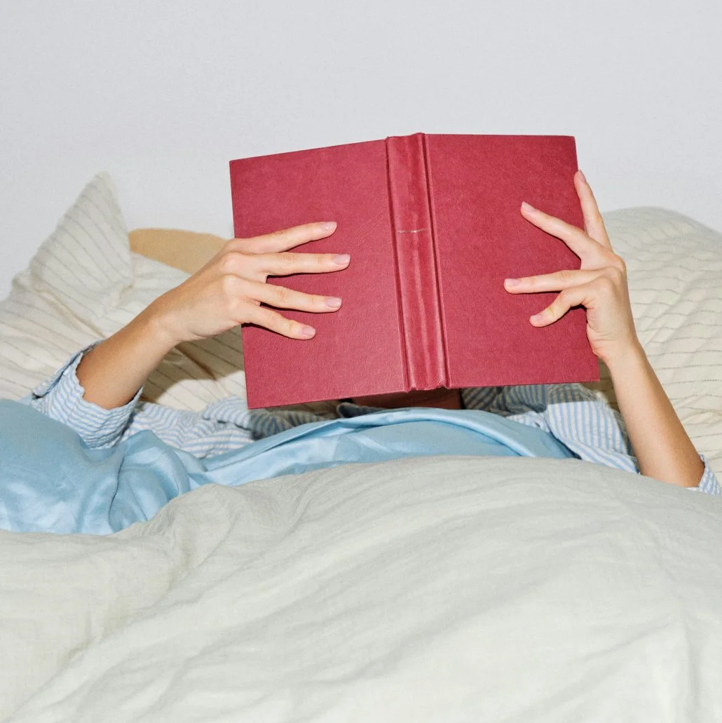 fertility-reading-bed-soft-morning.jpg