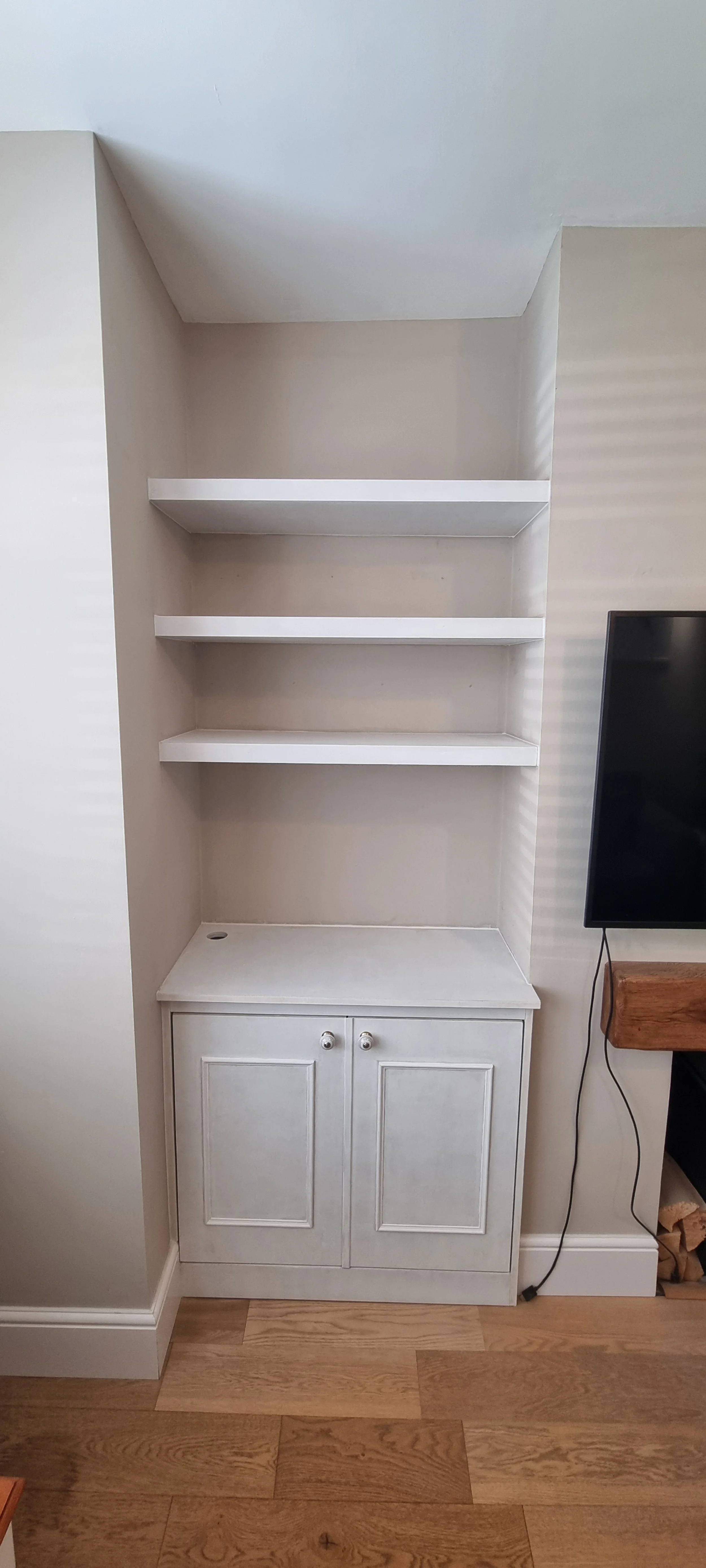 Custom made alcove cabinets and shelves Poole.jpg