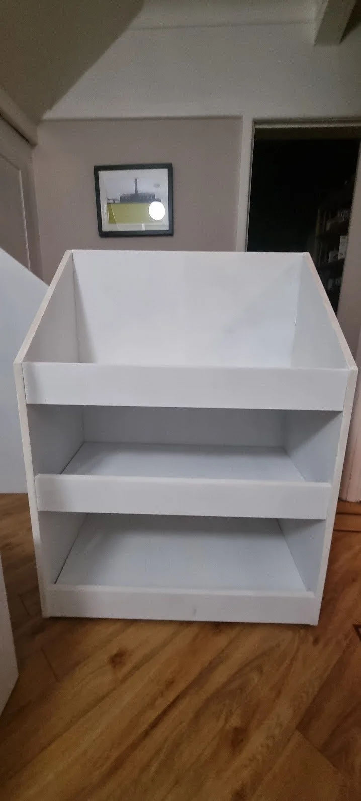 Custom made trolley under stairs.jpg