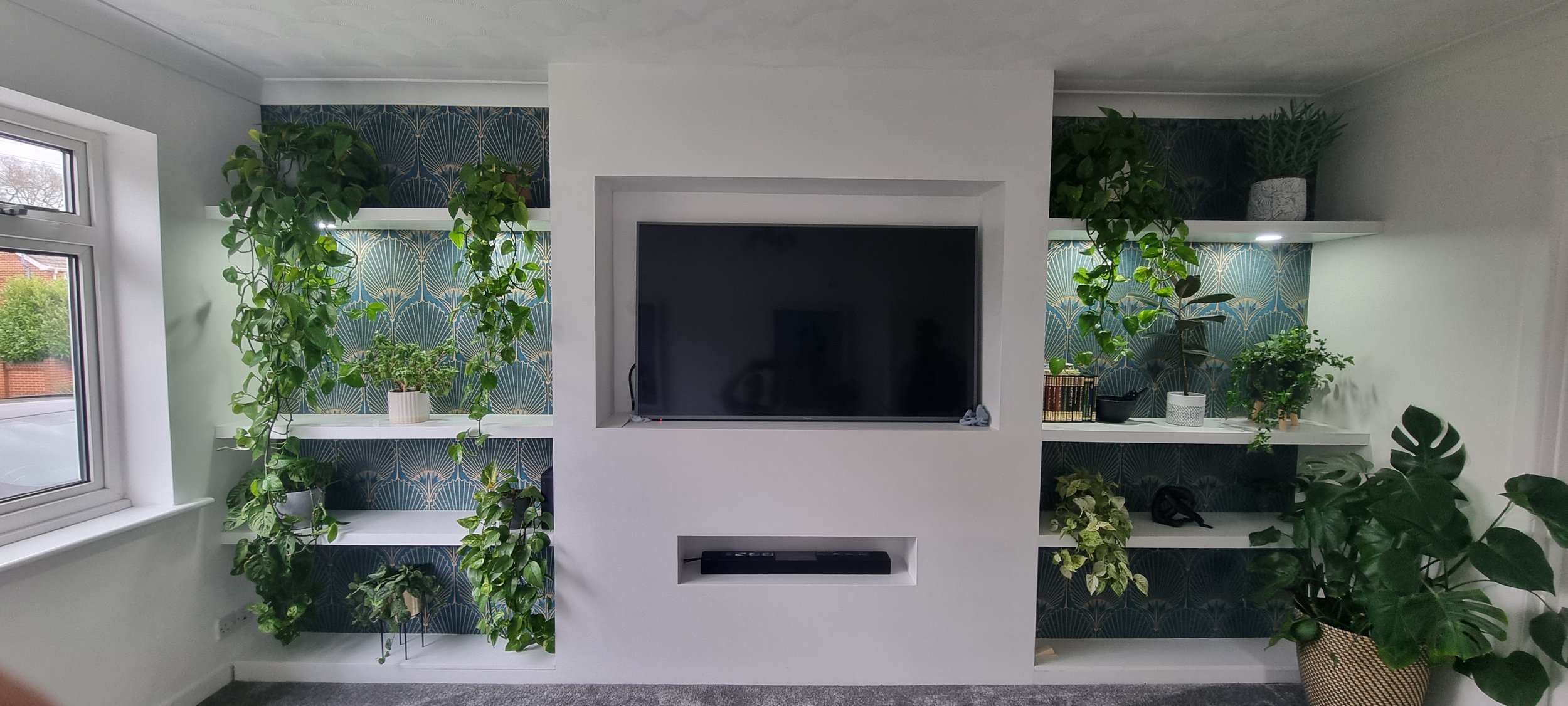 Custom made media wall built in downlights.jpg