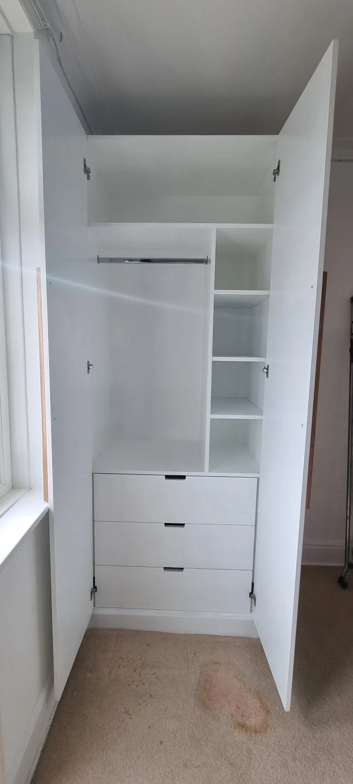 Besopke wardrobe with drawers sandbanks.jpeg