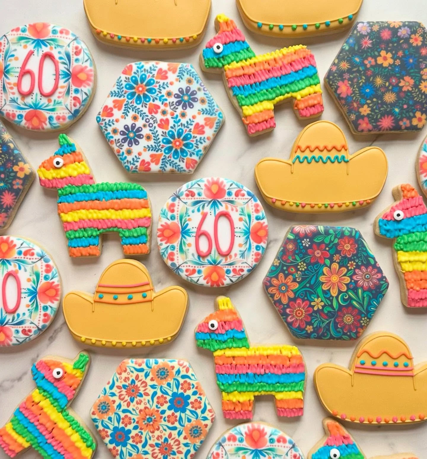 60th birthday fiesta set! The pi&ntilde;atas were so fun🎉🪅