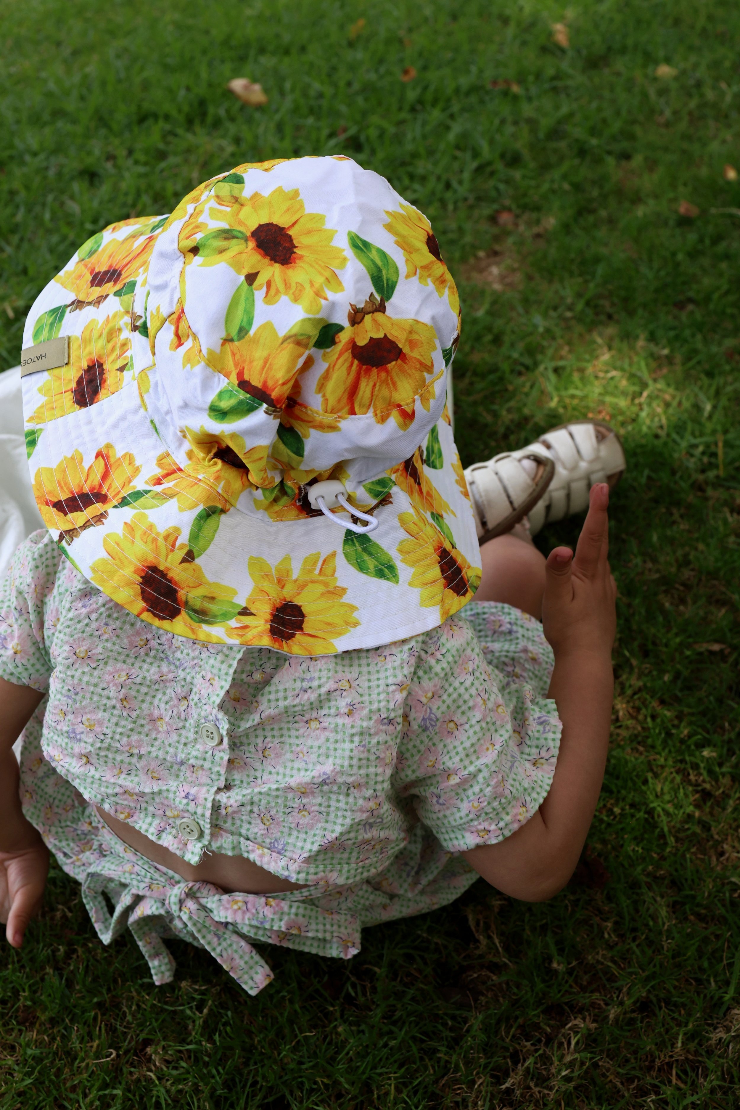 Bloomy Brim hat in Golden Bloom, sunflower prints, and UPF50+ protection.