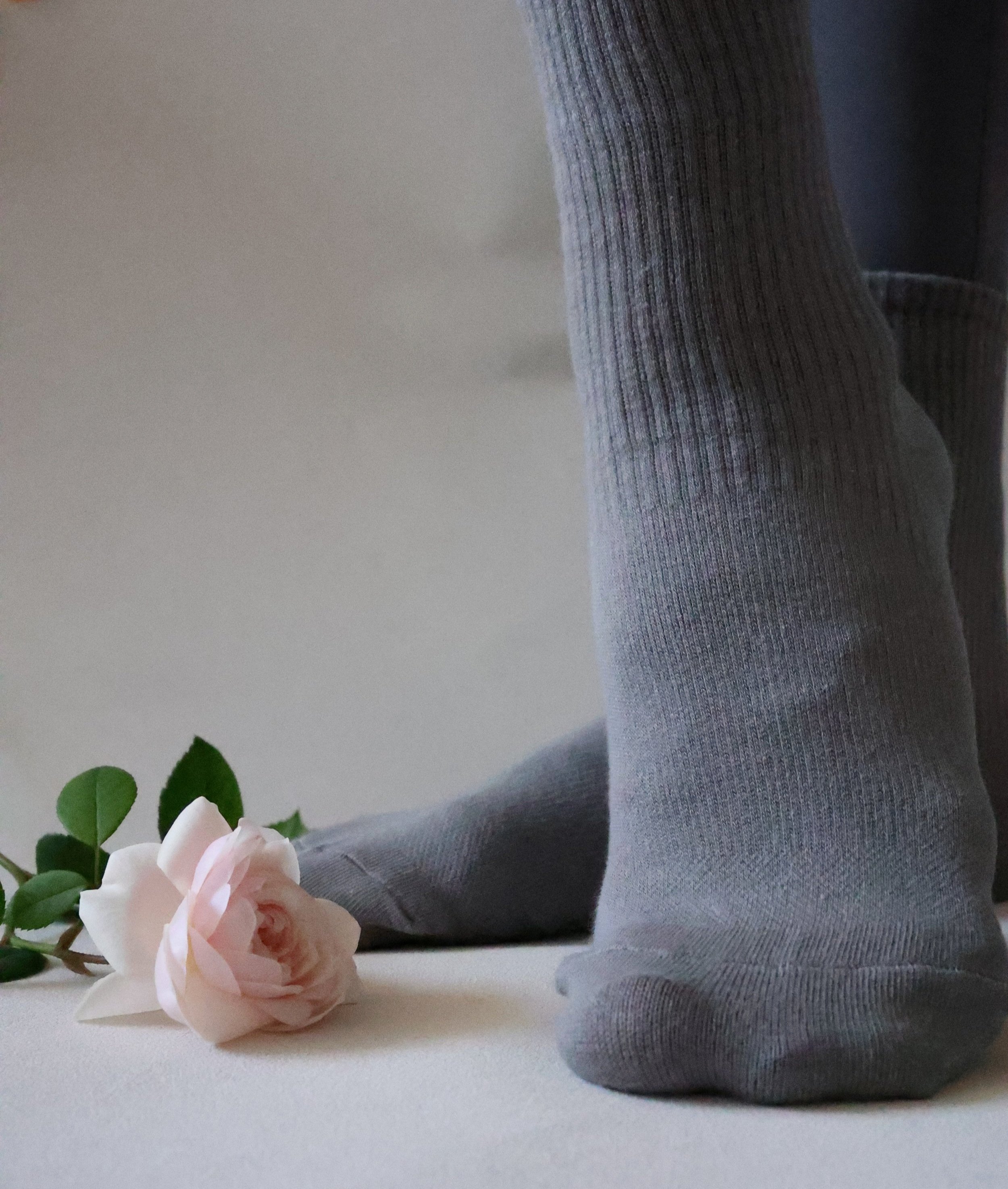 Dark grey Pilates socks with sparkling silicone anti-slip soles, crafted from premium cotton for ultimate comfort during mindful movements.