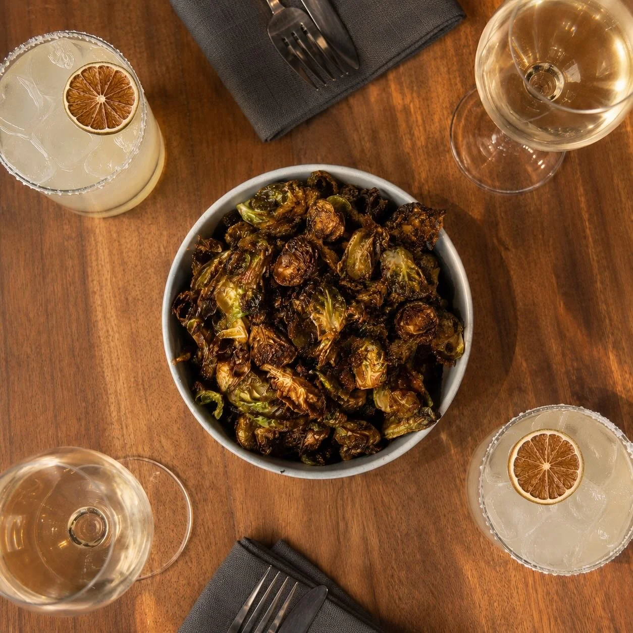 The famous Brussels Sprouts. Organic, crispy, additive. Take &lsquo;em sweet with local honey and lemon, or tangy with house made kimchi. Ya, we make our own kimchi.