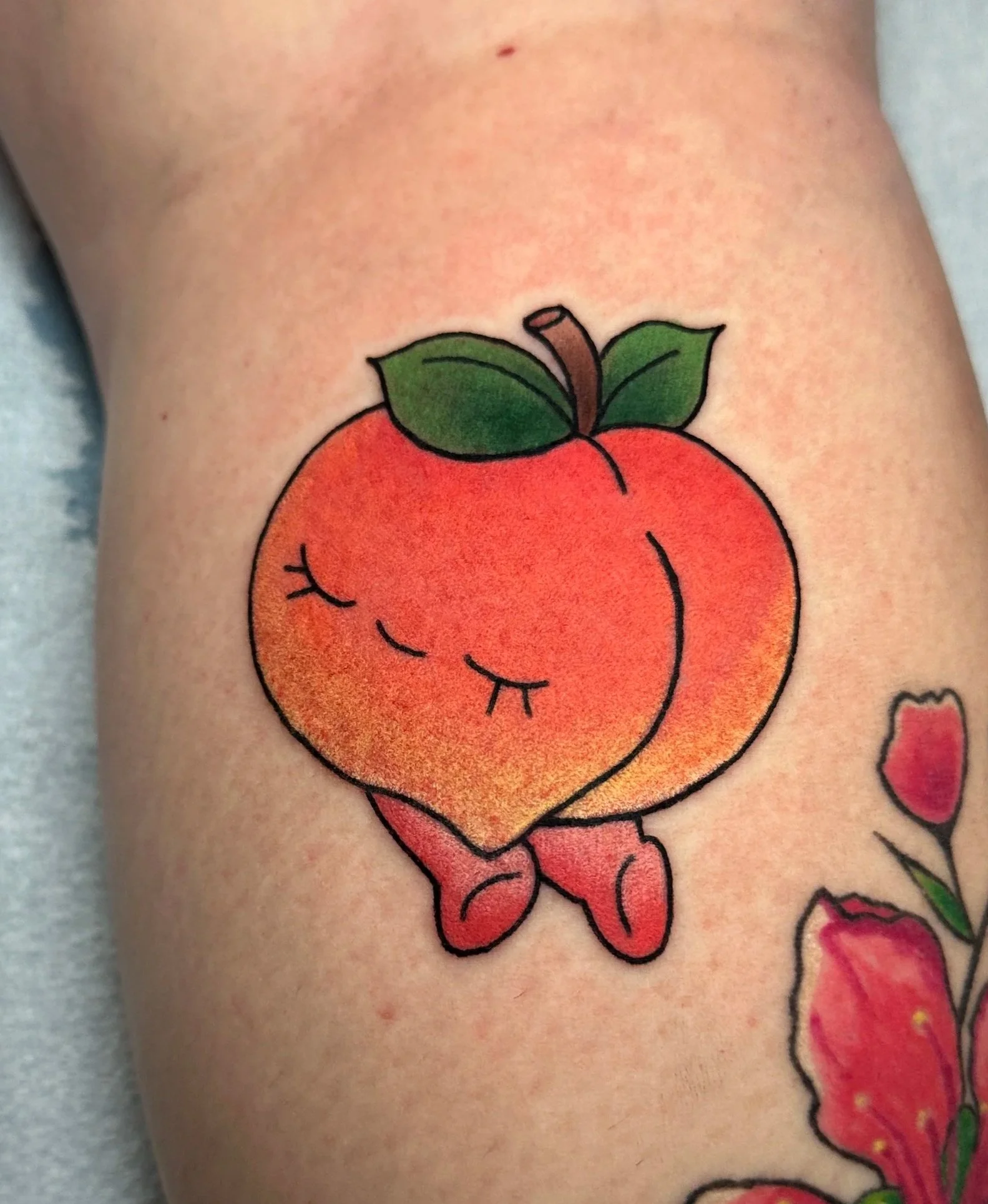 Cute fruit tattoo by woman tattoo artist in San Diego Kristine Tran